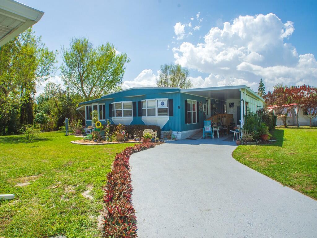 Charming and well maintained 2-bedroom, 2-bath home in the desirable River Park area. This move in ready property features an updated kitchen and primary bath (2023), a spacious living room, and a bright Florida room. Accessibility upgrades include a roll in shower, grab bars, lift system, and front entry ramp. Recent improvements—exterior paint, new water heater, and roof re coat (2025)—provide added peace of mind. Situated on an oversized, beautifully landscaped lot, this home offers comfort, convenience, and thoughtful updates throughout.