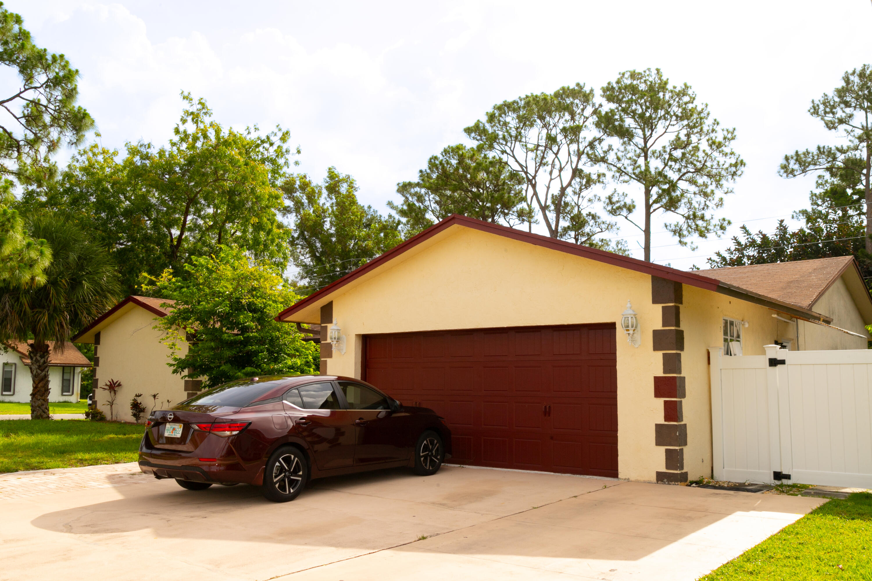 Beautiful single-family home located in the desirable Lakes of Lantana community in Lake Worth. This spacious residence features 3 bedrooms, 2 bathrooms, and approximately 1,734 living square feet with a functional split-bedroom floor plan designed for comfort and privacy. The home offers bright living areas, a family room, formal dining space, walk-in closets, and a screened patio perfect for relaxing or entertaining. Situated on a generously  sized lot with a 2-car garage, the property combines indoor comfort with outdoor enjoyment in a quiet residential neighborhood close to shopping, schools, parks, and major highways.    Spacious split floor plan Screened and covered patio Large backyard with garden views Central A/C and heating Walk-in closets 2-car garage
