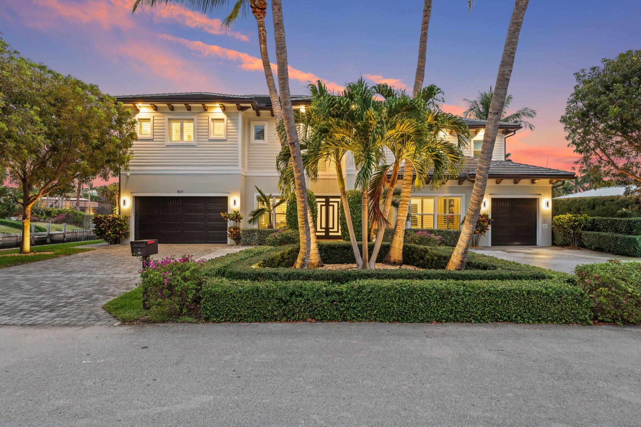 Welcome to 917 Tropic Boulevard, a distinguished residence in the esteemed waterfront community of Tropic Isle, Delray Beach, Florida. This exquisite property, built in 2018, epitomizes luxury living with its expansive 4,630 square feet of meticulously designed space. Offering five bedrooms and five bathrooms, this home is a sanctuary for those who appreciate both elegance and functionality.  Situated on a prime lot with 200 feet of deep-water frontage, this estate is a boater's paradise, providing ample docking space for yachts and watercraft. The open-concept floor plan enhances the sense of space and light, seamlessly integrating the living areas with a gourmet kitchen. This culinary haven is equipped with top-of-the-line Thermador appliances, a substantial quartz island, and premium fixtures, all complemented by breathtaking panoramic water views.  The property boasts a range of high-end amenities designed for comfort and convenience. Central air and electric cooling ensure a pleasant climate year-round, while central and electric heating provide warmth during cooler months. The residence features a private pool and spa, perfect for relaxation and entertainment, alongside a screened porch for enjoying the outdoors in comfort.  Hardwood and tile flooring grace the interiors, adding a touch of sophistication, while a circular driveway and garage with a door opener offer ease of access and security. The outdoor space is further enhanced by an outdoor grill, ideal for alfresco dining and gatherings.  This home also includes a private guest suite and a dedicated home office on the first floor, catering to the needs of modern living. The combination of thoughtful design, premium amenities, and a prime waterfront location makes 917 Tropic Boulevard a rare offering in the Delray Beach real estate market.  Experience the epitome of Florida living in this exceptional estate, where every detail has been crafted to provide a lifestyle of unparalleled luxury and comfort.