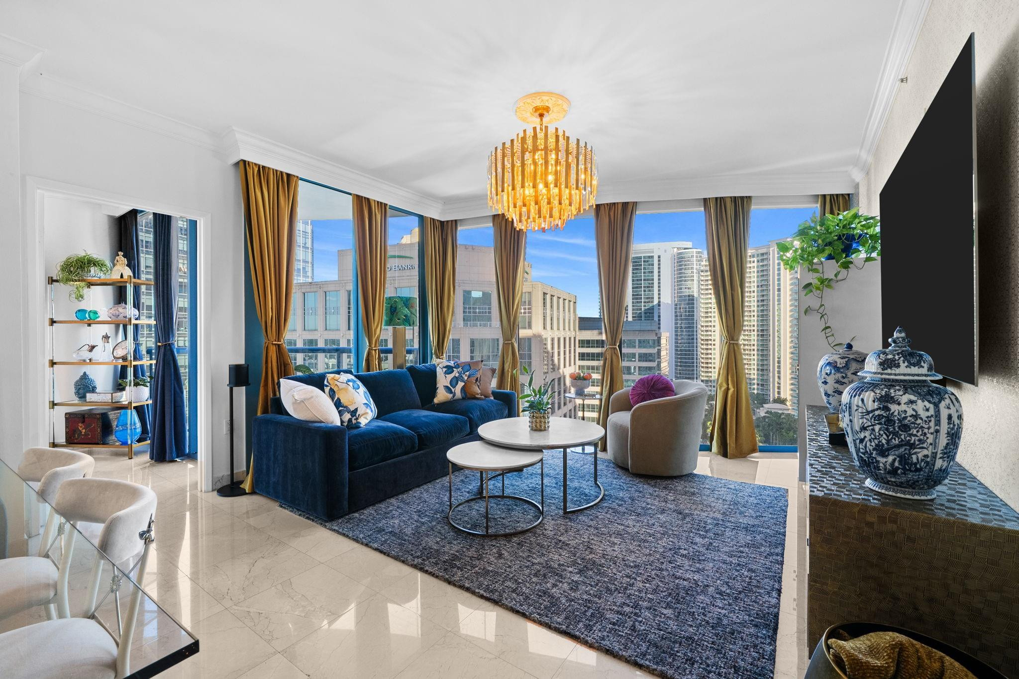 Priced To Sell FAST!  This Two Bedroom/ Two Bath Residence is located in the Heart of Las Olas in the Premier Tower~Las Olas River House. Featuring Marble Floors Throughout, Floor to Ceiling Rounded Glass Walls, this Split Bedroom Floor Plan is Perched Above the Vibrant City Lights, Tranquil River Walk, Fine Dining & Shopping! Steps to the New Huizenga Park, a river front 3.6 acre "outdoor living room" where neighbors enjoy the South Florida Sunshine. This residence encompasses all that Las Olas Living is About! Views, Location, and Modern Luxuries. It is the Perfect Place to Be! Spacious in Size, Glass Walls, Large Closets, Spa Like Baths, Gourmet Kitchen with Top of the Line Appliances, and Brand New Amenities that Must be Seen! Las Olas River House is The Place to Be!