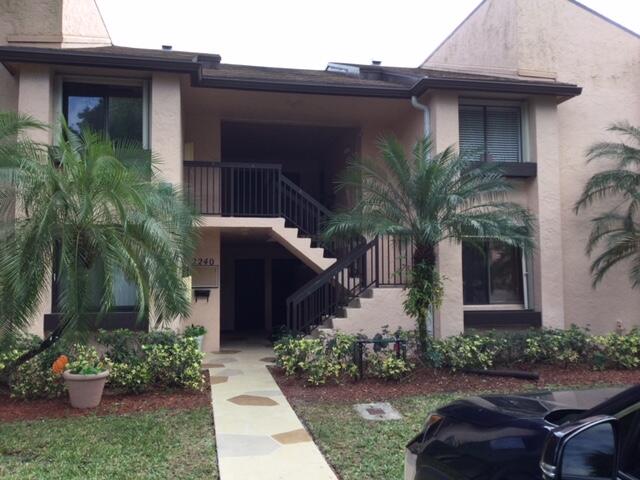 Beautiful spacious second  floor garden apartment with spectacular view of lagoon and golf. Screened in patio with pull down shutters and accordion shutters on all other windows. Eat in Kitchen and full size washer and dryer in kitchen area. Storage room and community pool. This is a bargain and a MUST SEE!