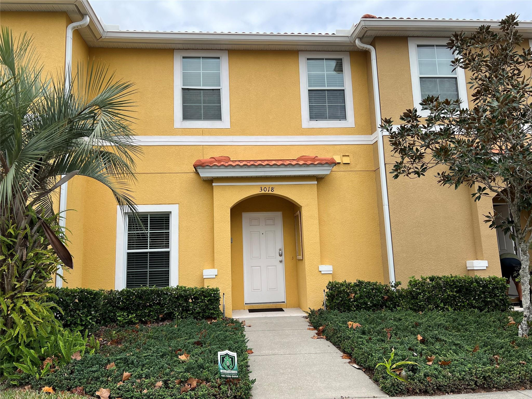 PRICED TO SELL.  Excellent Investment Opportunity for Short-Term Rentals, a Vacation Home, or a Year-Round Residence.  Close proximity to Disney World Theme Park, entertainments, restaurants, and shops.  Fully furnished 2-story townhouse unit in a desirable Guarded Gate community with Resort Style amenities.  Two bedrooms and two and a half bathrooms functional layout.  Full-sized washer & dryer and a spacious storage room inside the unit. Screened patio.  Updated kitchen.  Basic Cable and Wifi services are included in monthly maintenance. Call Now to schedule a tour.