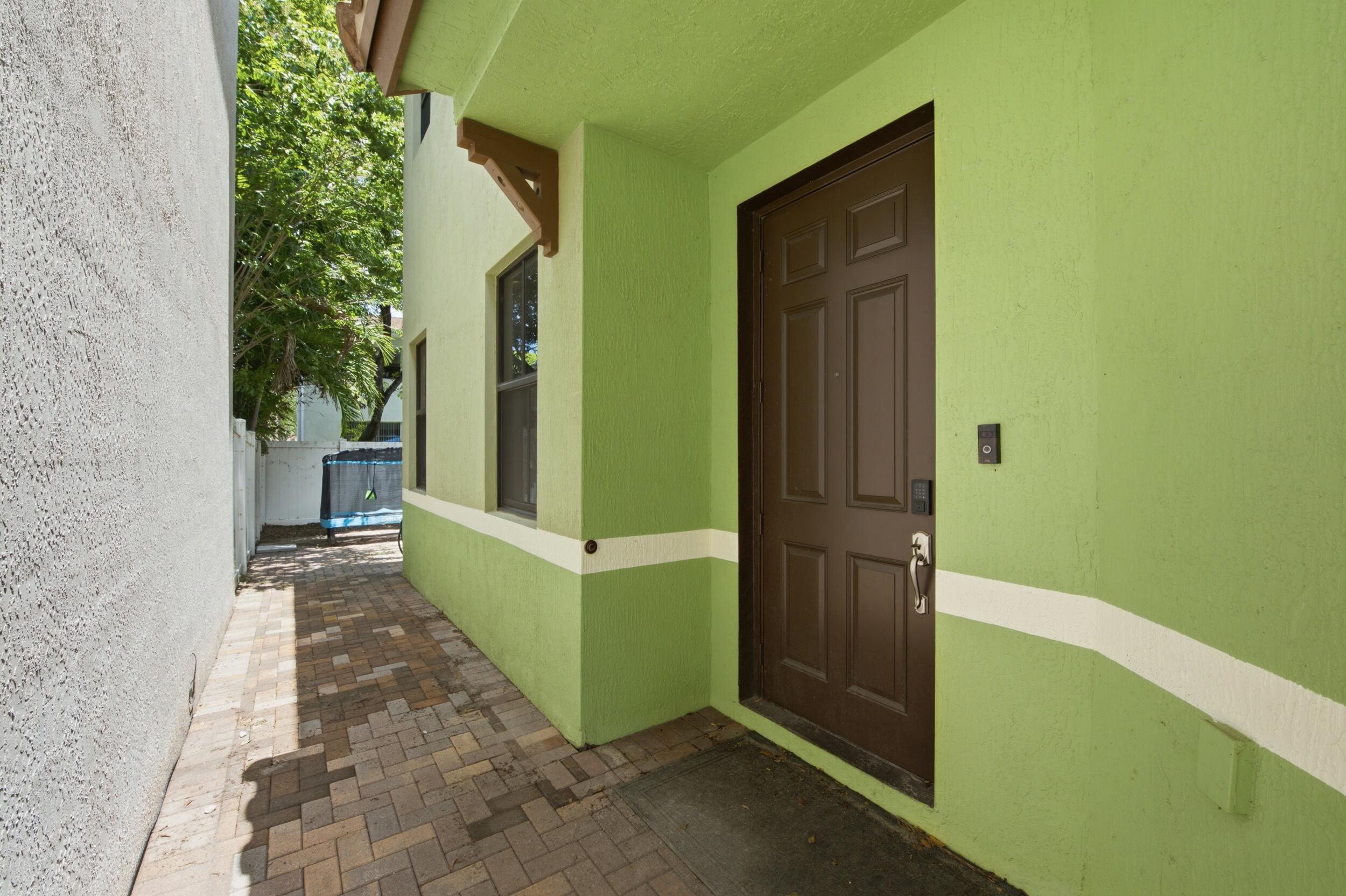 Modern Living in the Heart of Tamarac. Welcome to Sabal Palm of Prestige. This home is well maintained with 4 spacious bedrooms and 2.5 bathrooms perfectly designed for modern living. Enjoy the fenced in back yard with lots of room to entertain or just relax. Impact windows and doors. A convenient half bathroom on the main level.  The kitchen has granite countertops, stainless steel appliance. The primary bedroom has a walk-in closet.  The washer and dryer are on the second floor.  The friendly neighborhood has easy access to major highways, shopping and restaurants.