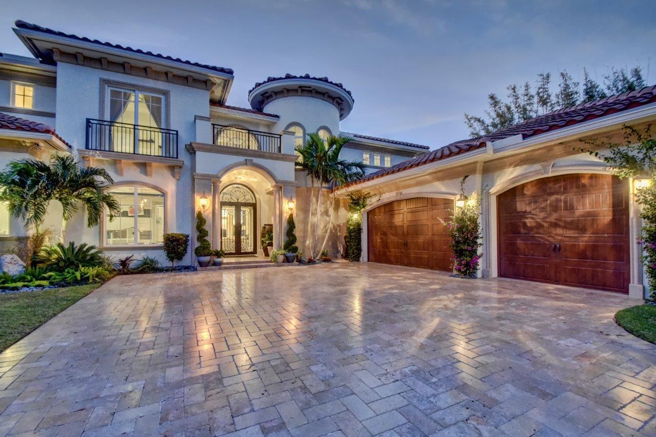 BEST DEAL ON THE WATERFRONT! JUST REDUCED AGAIN!PRICED FOR IMMEDIATE SALE! COMPLETED 2013! ONE OF A KIND DIRECT INTRACOASTAL DREAM ESTATE! THIS IS A RARE AND SPECTACULAR ''NO WAKE ZONE'' LOT IN AN IDEAL LOCATION! ENJOY THE GORGEOUS VIEW AND BOATS AS THEY CRUISE BY FROM YOUR BRAND NEW INFINITY RESORT STYLE POOL, WITH 5 BEDROOMS PLUS A GUEST HOUSE AND YOUR MASTER DOWN THIS FLOOR PLAN IS IDEAL FOR ANY FAMILY! THE RICH WOOD FLOORING THROUGHOUT,FIREPLACE, DRAMATIC STAIRCASE, GOURMET STATE OF THE ART CARRERA WHITE KITCHEN,AND VIEWS FROM EVERY ANGLE SIMPLY TAKE YOUR BREATH AWAY. ALL OF THIS AND A SPACIOUS YARD FOR KIDS TO PLAY! THIS IS TRULY A GEM AND A BOATERS PARADISE, JUST MINUTES FROM THE BOCA INLET AND QUICK WALK TO THE BEACH! THIS LOCATION AND HOME IS A MUST SEE!