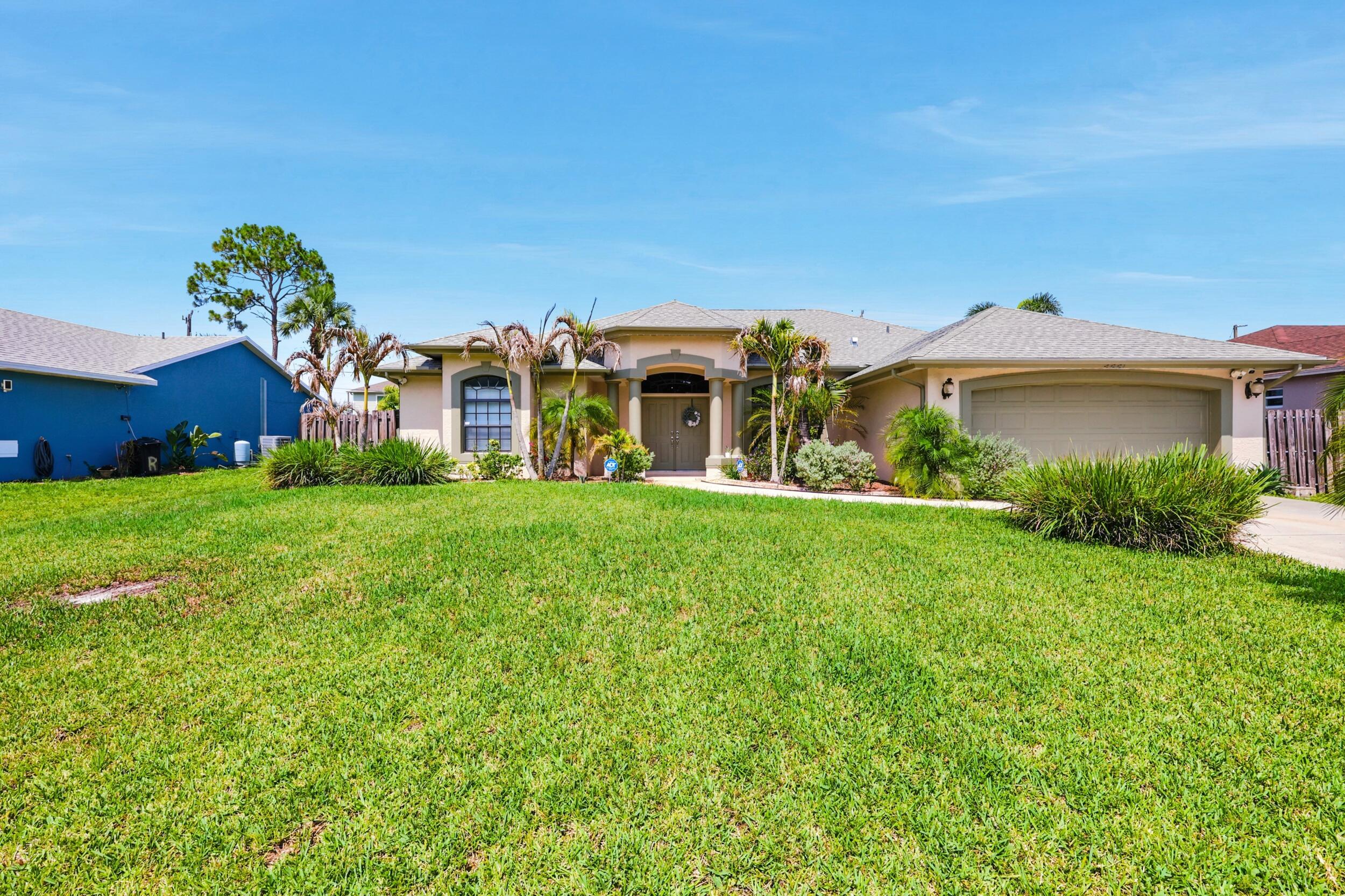 Welcome to this move in ready single-story pool residence in Port St. Lucie offering over 2,000 square feet of comfortable living space. This three-bedroom, two-bathroom home provides a split floor plan, with the convenience of a two-car garage for vehicle storage and protection. Some of the home highlights features a brand new 2023 roof, 10 year A/C warranty, all new plumbing in bathrooms (including new toilets, faucets, and master shower), brand new pool pump system, firepit, ADT security alarm system, BLINK floodlights and cameras.  Built in 2005 with only one owner and has been kept in immaculate condition!