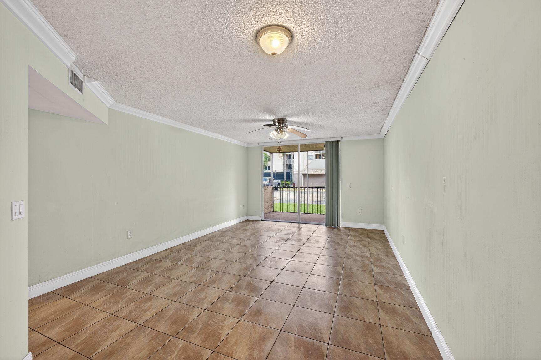Bright and spacious first-floor 1-bedroom, 1-bathroom corner unit in the desirable Vistas at Doral. Features include a screened patio, extra storage, and a washer and dryer inside the unit. Enjoy resort-style amenities, including a pool, fitness center, tennis courts, and 24-hour security. Conveniently located near top-rated schools, shopping, dining, and major roadways. Move-in ready!