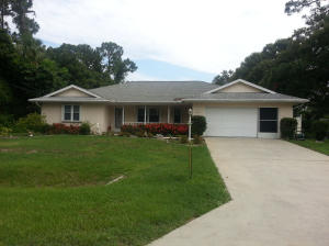 Huge 2/2 Open Floor Split Plan. A large Family Room that overlooks the lake. There are sliding glass doors leading to an enclosed patio, for a great view & of course, easy entertaining. Inside laundry room, with a utility sink & a huge 2 car garage with screening, & a tool shed out back for extra storage. Great for a 1st time home buyer! In the desired location of Lakewood Park. A definite must see & ready for your offer!!