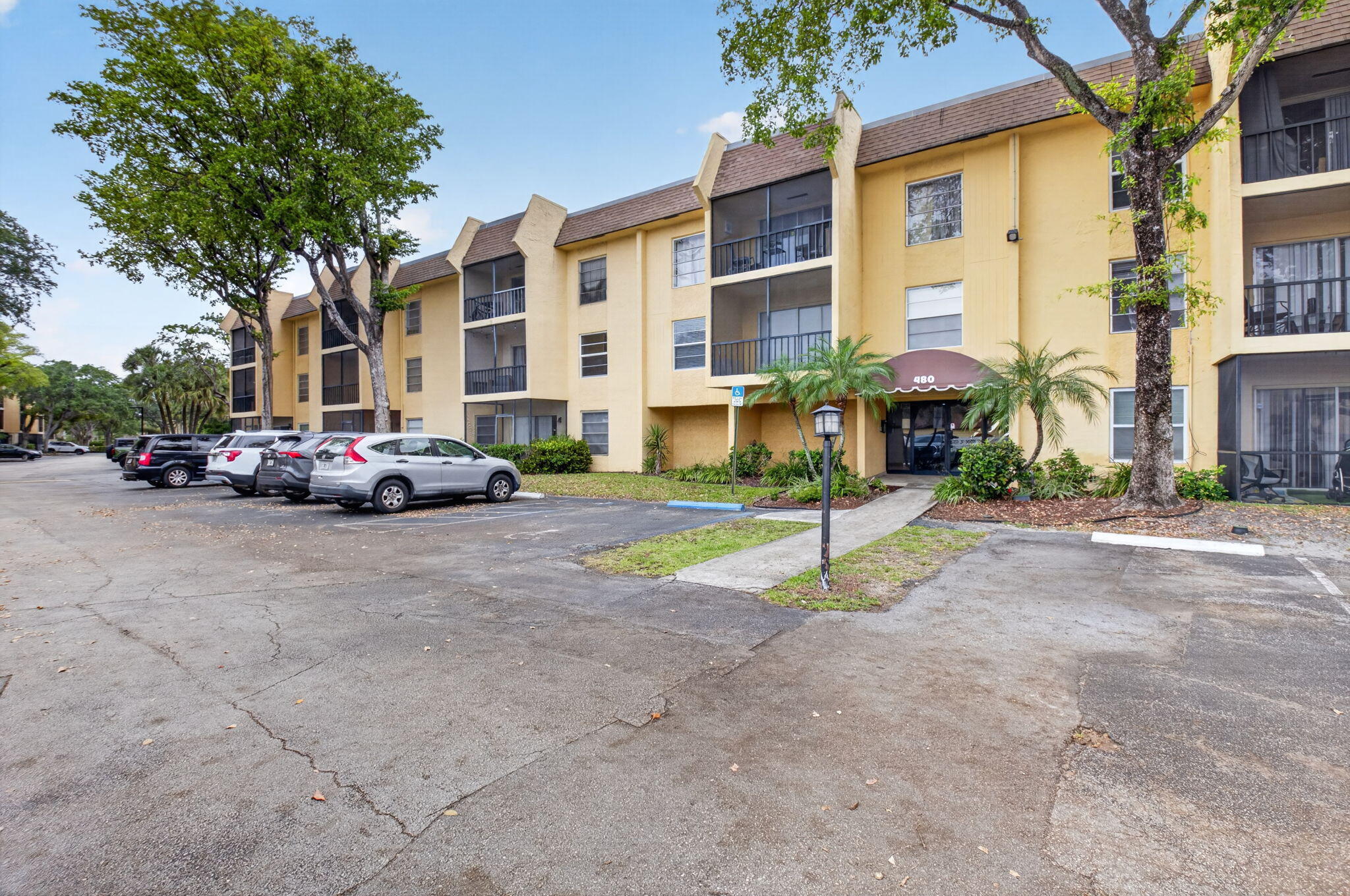 Fully renovated and move-in ready! This beautifully updated home features vinyl wood and marble flooring & stunning quartz countertops that elevate the modern kitchen. Walking distance to FAU, this property offers both convenience and lifestyle. Enjoy added value with water and basic cable included in the condo fees, along with a secure, locked entry & call box system. Major updates include stainless steel refrigerator and water heater for peace of mind. The community amenities are just steps away, with a pool and tennis courts located across the parking lot. On-site laundry facilities are conveniently located on the 1st floor!