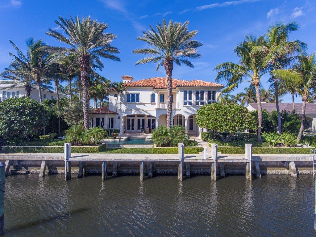 Set behind the guard-gated causeway entry of Point Manalapan, this refined European-inspired masterpiece stands on the shores of this exclusive ultra-private island enclave of Hypoluxo Island, across from Manalapan’s ocean coastline.  Adorned with groomed foliage, a graceful courtyard entry sets the timeless tone of this five-bedroom residence designed by noted South Florida architect Randall Stofft and custom built to exacting standards by Wm. L. Construction. The information herein is deemed reliable and subject to errors, omissions or changes without notice.  The information has been derived from architectural plans or county records. Inside the arched entrance, the classic look takes a fresh turn in the comfortable, light-bathed living spaces fashioned with custom architectural elements and exquisite designer finishes.   The flow functions beautifully for entertaining with French doors to the outdoor living room and garden terrace surrounding the luminous infinity pool in a relaxing resort-like oasis overlooking the waterway to the wooded coastline beyond.  Notable features of the home include the authentically designed theater room, the executive's office/library, and the grand master suite offering the luxury of a private waterfront balcony, two separate baths, and an adjoining fitness studio.  The full complement of high-end systems ensures the utmost in personal comfort and convenience.  Rounding out this absolutely flawless estate, the boater has full-service dockage on the deep-draft waters in the rare tranquility and exclusivity of Point Manalapan.

Location
Curlew Road, Manalapan, Florida.  Hidden away in Old Florida serenity, Point Manalapan is an exclusive guard-gated enclave of Hypoluxo Island, surrounded by the Intracoastal Waterway, with Manalapan's ocean beachfront just across the bridge.  Manalapan residents enjoy deeded club privileges at the Five-Diamond Eau Palm Beach Resort & Spa.  Centrally located in the heart of South Florida's Gold Coast, Manalapan is only about 10 miles south of Palm Beach and about 15 miles north of Boca Raton.

Property
Giving a scenic viewpoint on the water to the wooded coastline, this impressive European-inspired estate was painstakingly created by architect Randall Stofft, custom builder Wm. L. Construction, and landscape architect Warren McCormick & Associates.  A lushly planted motor court sweeps to the courtyard entry between two garages with a total of three bays.  French doors open the water side of the house to the resort-style outdoor entertainment space where the wraparound loggia is served by a summer kitchen with Viking appliances.  Finished in Jerusalem stone, a garden terrace surrounds the infinity-edge saltwater pool.  The 100Â±-foot shoreline is outfitted with full-service, deep-draft dockage.

Residence
Classic tradition takes on freshly refined ease in this exquisite masterpiece totaling 8,117Â± square feet with five bedrooms and six and a-half baths.  Jerusalem stone and mahogany floors, Downsview cabinetry, and Waterworks bath fixtures are among the exceptional finishes.   High-end amenities include the Marvin impact-glass windows and exterior doors, full-house generator, elevator, energy-efficient Lennox air conditioning, and Crestron automation that controls the lighting, indoor/outdoor sound system, window treatments, and pool equipment and pool lights.

First Floor:  Flowing ahead of the Jerusalem stone foyer, the light-filled living room is glassed with a wall of French doors to the waterside loggia, and is anchored by a gas fireplace with limestone mantel.  Also, opening to the loggia, the dining room is grounded by inlaid marble flooring.  Connecting through a butler's pantry/wet bar, the kitchen is stylishly architected with Downsview custom cabinetry, French limestone perimeter counters accented by the Waterworks glass tile backsplashes. Waterfall design Calacatta Gold center island with custom made spa sink and Dornbracht fixtures. Chef's appliances include the Miele 48-inch dual-fuel range with 6-burners, griddle and 48-inch hood, dual Miele convection ovens, steam oven and two warming draws, two Miele dishwashers, three Sub-Zero refrigerators with freezer drawers and built in Miele coffee system. Encompassing a circular breakfast bay, the bright open family room leads out to the loggia.  The separate laundry room includes Downsview custom cabinetry and LG appliances.  Private movie screenings are hosted in the high-tech theater room featuring Wilson surround-sound speakers, a 3D high-definition projector, and nine reclining leather seats below the starlight ceiling.  Tree-lined waterway views provide the backdrop for the executive's office/library which is handsomely styled with exotic Macassar ebony custom cabinetry, chevron-patterned American walnut flooring, and a coffered ceiling.  The private bedroom with wide-board American walnut flooring is served by the full cabana bath with antiqued Jerusalem stone floor, walls, and shower plus a Belle Ã‰poque console sink, mirror, and sconces.

Second Floor:  Ascending the rotunda-style staircase or elevator leads to the loft-style upper hall.  Filled with serene treetop views of the waterway, the sunlit window-walled master suite invites quiet relaxation in this beautifully spacious retreat opening to a waterside balcony.  Walk-in closets accompany the suite's two luxe baths featuring Calacatta and Emperador marble finishes, Barbara Barry cabinetry, and Kallista fixtures.  One of the baths includes a jetted tub plus a shower, and adjoins a waterside fitness studio.  Three more bedrooms all have wide-board American walnut floors and luxurious baths with designer finishes including a private balcony on the front bedroom and a second master bedroom with a private balcony and en suite bathroom that includes floor to ceiling Calacatta Gold marble slabs with dual sinks and Waterworks fixtures.

DISCLAIMER: The written and verbal information provided including but not limited to prices, measurements, square footages, lot sizes, calculations and statistics have been obtained and conveyed from third parties such as the applicable Multiple Listing Service, public records as well as other sources. All information including that produced by the Sellers or Listing Company are subject to errors, omissions or changes without notice and should be independently verified by any prospect for the purchase of a Property.  The Sellers and Listing Company expressly disclaim any warranty or representation regarding all information.  Prospective purchasers' use of this or any written and verbal information is acknowledgement of this disclaimer and that Prospects shall perform their own due diligence.  Prospective purchasers shall not rely on any written or verbal information provided when entering into a contract for sale and purchase.  Some affiliations may not be applicable to certain geographic areas. If your property is currently listed, please do not consider this a solicitation.   In the event a Buyer defaults, no commission will be paid to either Broker on the Deposits retained by the Seller. "No Commissions Paid until Title Passes."    Buyer pays title insurance, Florida documentary stamps, and all other closing costs for New Construction and land use. Copyright 2016 Listing Company.  All Rights Reserved.