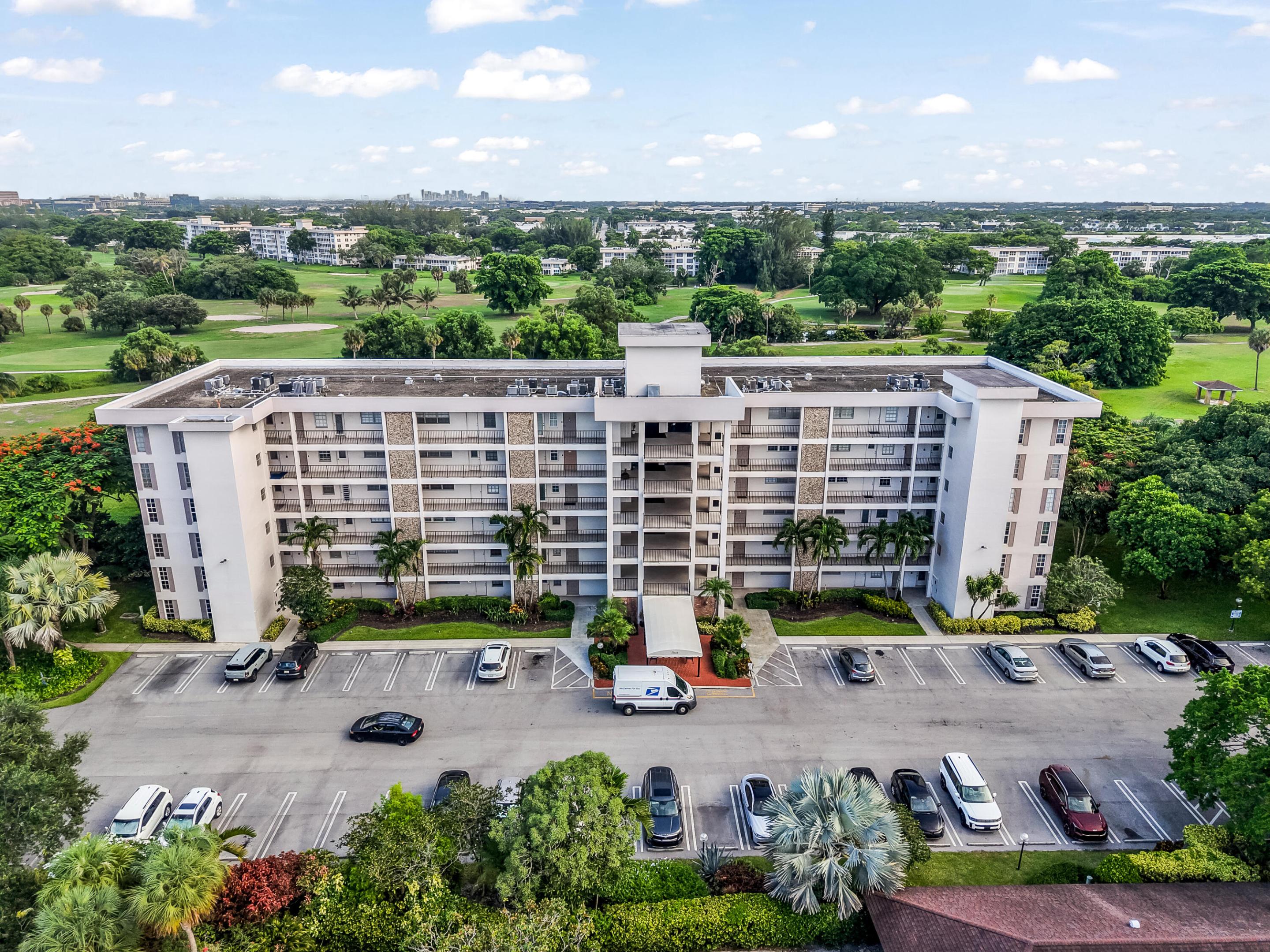 Beautifully remodeled 3-bedroom, 2-bath condo with breathtaking golf course views in the desirable Palm Aire Country Club. Showcasing a clean, modern design, this move-in-ready residence features new porcelain tile flooring throughout, creating a seamless and elegant living space. The stunning open-concept kitchen is the heart of the home, complete with quartz countertops, custom cabinetry, stainless steel appliances, and plenty of workspace for everyday living and entertaining. Both bathrooms have been tastefully renovated with designer finishes, contemporary vanities, and spa-inspired details that add a touch of luxury. Bright recessed lighting, a neutral color palette, and quality upgrades throughout enhance the home's stylish appeal. Relax on your private balcony while enjoying tranquil golf course views in this beautifully maintained community.  Conveniently located near shopping, dining, entertainment, beaches, and major highways, this exceptional condo offers the perfect combination of comfort, style, and convenience. Easy to show.