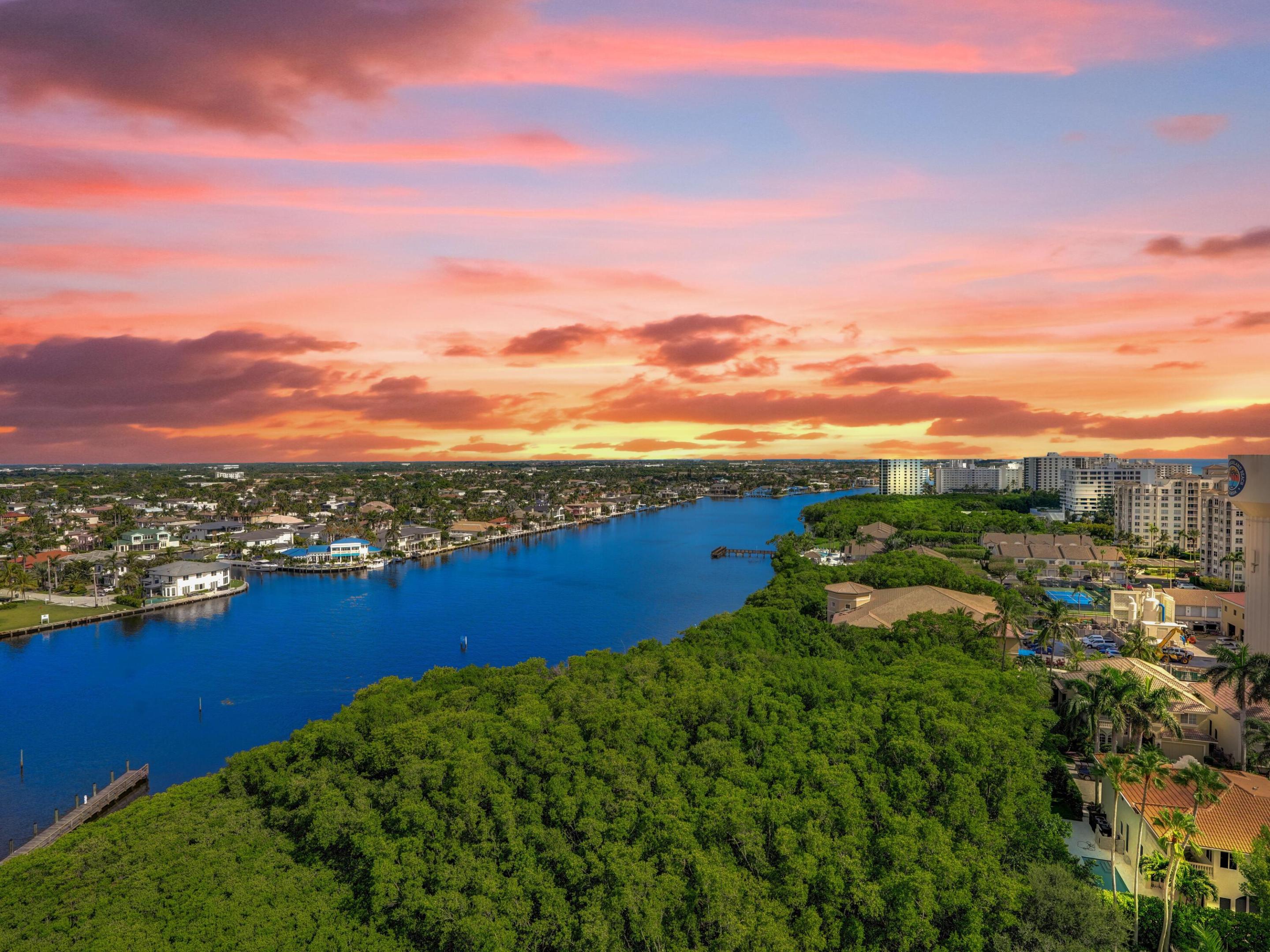 Discover luxury living at its finest in this exceptional double condo located in the exclusive Toscana community of Highland Beach. Spanning an impressive 4,661 square feet under air this residence features four bedrooms & four & a half baths, offering a lifestyle of elegance & comfort with breathtaking ocean, Intracoastal, & city views from oversized balconies. As you enter through the private elevator & step into the grand foyer, you'll be captivated by the open floor plan, perfect for entertaining. The gourmet kitchen is a chef's dream, equipped with double Sub-Zero refrigerators, a Dacor range, & banquet seating, with easy access to an extraordinary balcony capable of hosting 30 guests for dinner. The large formal living room boasts high-end custom cabinetry and a built-in bar, While the grand dining room is ideal for hosting large dinner parties. For more casual gatherings, the family room offers a cozy space for television watching and relaxation. The oversized primary suite is a serene retreat, where you can wake up to stunning sunrises over the ocean. Three additional guest bedrooms, each with en-suite baths, provide comfort & privacy for family and friends. Toscana residents enjoy five-star amenities, including valet service, a private beach club, three swimming pools, a hot tub, state-of-the-art fitness centers, outdoor bbq grill areas, tennis courts, bocce ball, & a vibrant social calendar. The community is secured with 24-hour concierge & guard-gated services, ensuring peace of mind in this luxurious coastal enclave.