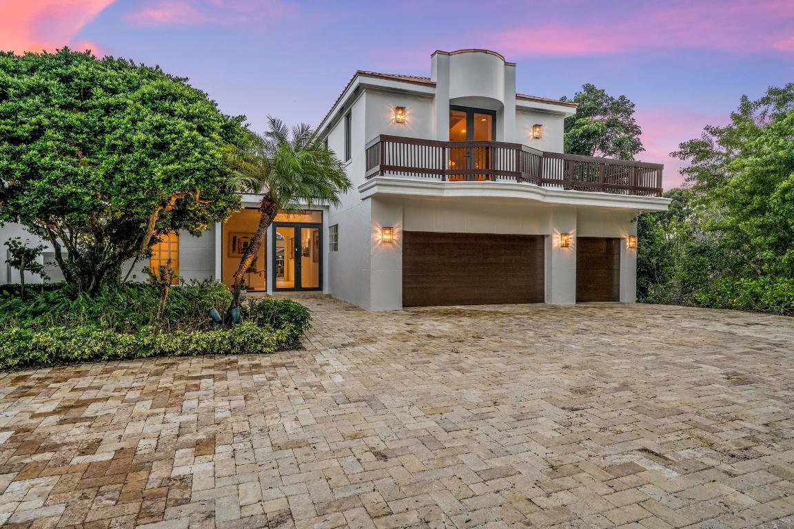 Experience 180° Intracoastal views from this 5BR, 6.1BA estate on a premier corner lot in Frenchman's Creek Beach & Country Club. A private Brazilian Ipe dock features a boat lift, jet ski lift & space for up to a 50' vessel. Enjoy resort-style living with a saltwater pool, spa, hot tub, outdoor shower & expansive entertaining areas. Inside, an upstairs loft captures breathtaking water vistas, while a cozy fireplace enhances the refined design. This residence offers the ultimate in private waterfront luxury, full-service beach club amenities, tennis, pickleball and 36 holes of golf.