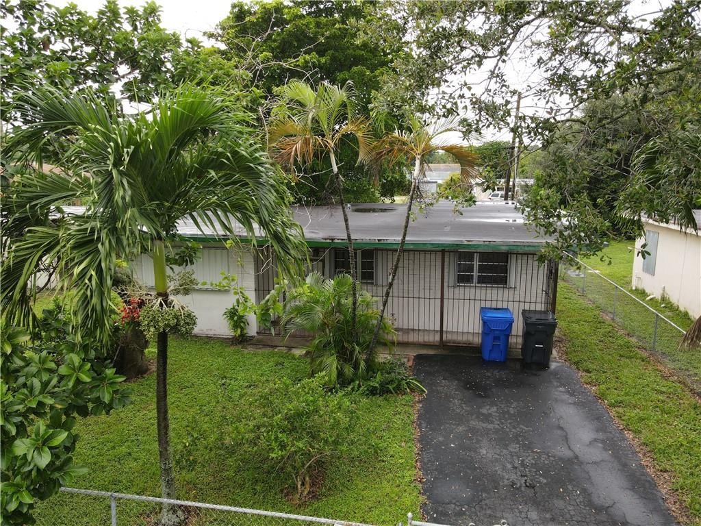 Great opportunity for an Investor or for anyone looking for a fixer upper. Flat roof is approximately 10 years old. Hurricane Shutters on most of the windows. This home is conveniently located just minutes from major roadways, shopping, dining, and more!