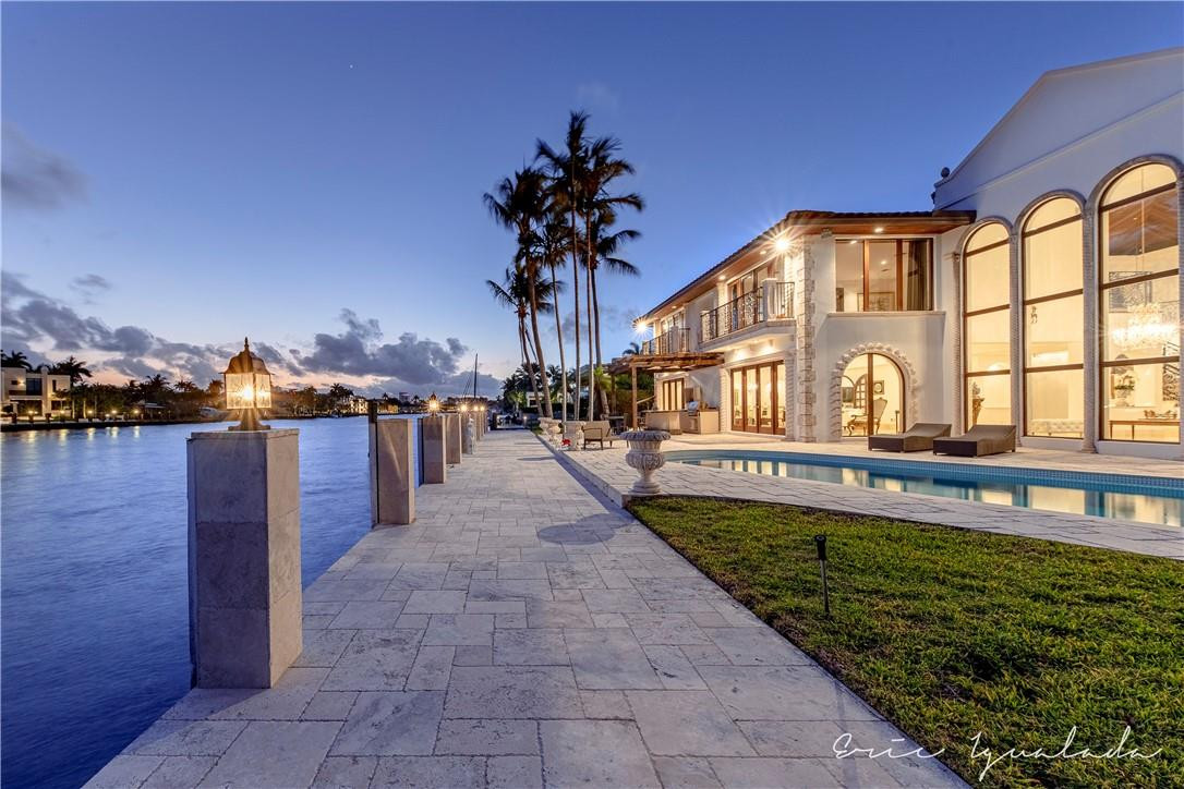 Yachtsman Paradise. Luxury estate, with incredible open views of the 300' wide Rio Barcelona and the Northern Las Olas points. Extensive renovation in 2010/11, $1 million in updates. Impressive soaring 25' ceiling in the living area, formal dining, huge family room, master suite with sitting area, library. Great floorplan, with views from everywhere. 100' concrete dock, Amazing pool and outdoor entertainment area. Located in the prestigious community of Sunrise Key, close to renown Las Olas shopping, restaurant and beaches. Updates include over 1000 sf addition of 2 bedrooms 2 baths upstairs and extended living room Changed floorplan downstairs to create guest suit and office. Updated all bathrooms. New roof, kitchen, Impact doors and windows, flooring. New concrete Dock and sea wall cap. Yachtsman Paradise. Luxury estate, with incredible open views of the 300' wide Rio Barcelona and the Northern Las Olas points. Extensive renovation in 2010/11, $1 million in updates. Impressive soaring 25' ceiling in the living area, formal dining, huge family room, master suite with sitting area, library. Great floorplan, with views from everywhere. 100' concrete dock, Amazing pool and outdoor entertainment area. Located in the prestigious community of Sunrise Key, close to renown Las Olas shopping, restaurant and beaches. Updates include over 1000 sf addition of 2 bedrooms 2 baths upstairs and extended living room Changed floorplan downstairs to create guest suit and office. Updated all bathrooms. New roof, kitchen, Impact doors and windows, flooring. New concrete Dock and sea wall cap