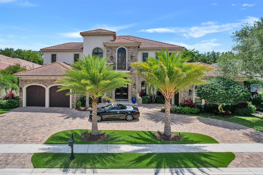 Stunning elegance and grandeur meet comfortable living in this incredibly appointed home perfect for families and entertaining. Upgrades and designer touches abound! Boasting 6 bedrooms and 7.2 baths plus an oversized office and theater room. The downstairs master is elegant and welcoming with his and hers bathrooms, pool access and views. The kitchen is a work of art perfect for entertaining with two islands, 3 ovens, 2 dish washers, a custom 6ft GE Profile fridge, all high end appliances- Viking, Wolf and Bosch- plenty of storage, and more! This complete Control 4 Smart Home gives you control of everything from temperature, to shades, to landscaping and more right on your smart phone from anywhere in the world.  The heart of the home is the fabulous, and very private, outdoor living spac Where lush landscaping surrounds an oversized pool with travertine decking, multiple water features and sun decks, and a mosaic reflecting pool. The elegance and convenience continue with a beautiful summer kitchen, 2 TVs, several fans set into the pecky cypress ceilings, a wood burning fireplace, and plenty of room for seating. The grand entrance/ living room features soaring ceilings (like every room in the home) an elegantly curved wrought iron staircase, and a custom wet bar with a Meile coffee maker, a fridge with ice maker and seating for 4. Upstairs are 4 oversized bedrooms, each with an elegantly appointed en-suite bathroom, a loft area with its own bar and balcony overlooking the pool, and a second laundry room. The entire home has impact glass windows and the 3 car garage has room for a car lift (current one does not convey). This house has too many features to list here, I've given you just some of the highlights of this VERY SPECIAL MUST SEE HOME.  I cant wait to show it to you in person