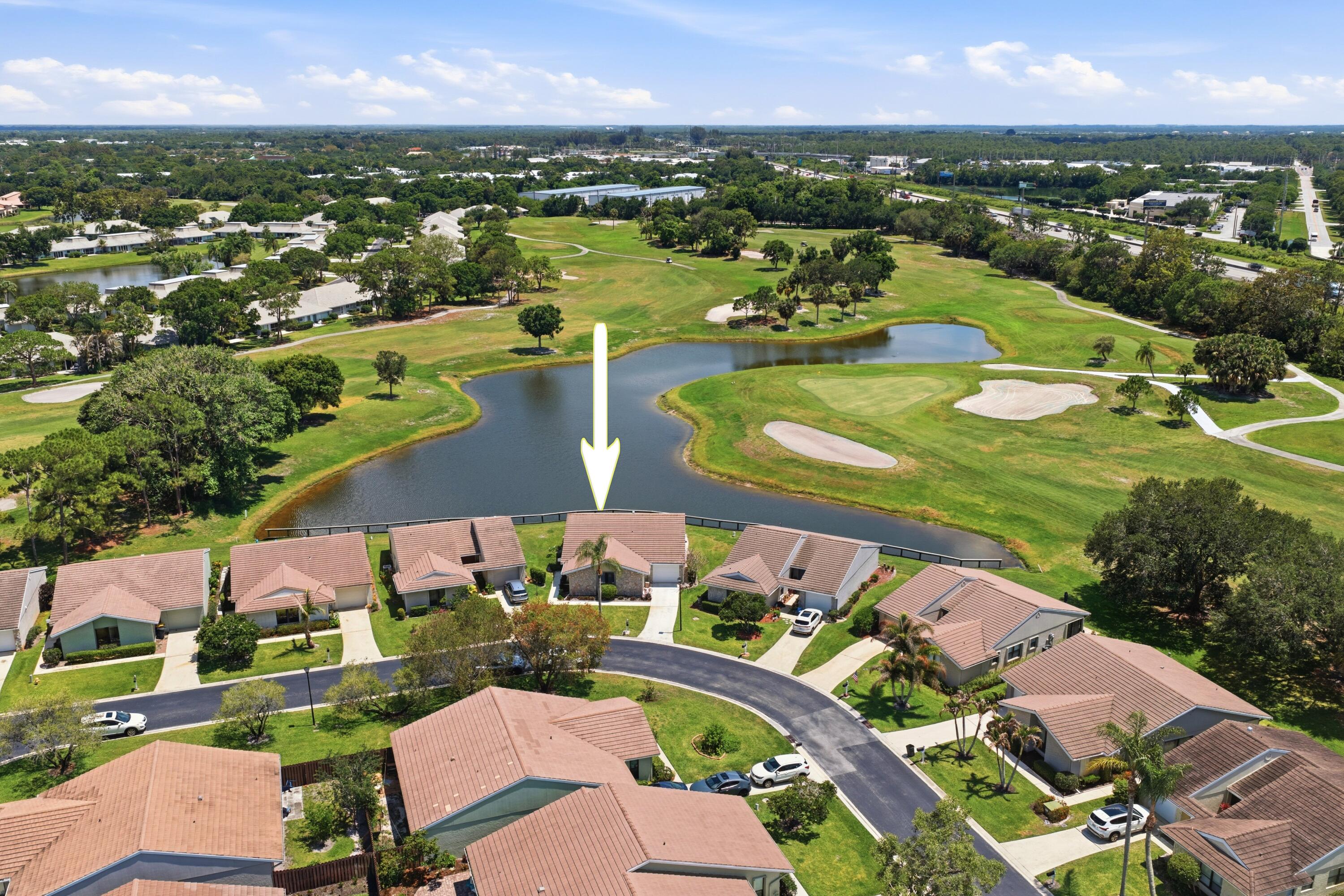 Enjoy breathtaking lake and golf course views from this well-maintained home located in the highly desirable Egret Pond community within Palm City's renowned golf course lifestyle. Major updates have already been completed, including updated primary bathroom, extended primary walk-in closet, a new A/C in 2025 and water heater in 2024. The property also features both accordion and panel shutters for added storm protection and peace of mind. Furnishings are negotiable, making this a fantastic opportunity for seasonal or full-time living. While the home offers the chance for cosmetic updates and personalization, the location and setting are truly exceptional.  Egret Pond is known for its quiet tree-lined streets, scenic surroundings, and access to a premier golf community lifestyle. Residents enjoy proximity to championship golf, tennis, pickleball, walking and biking paths, clubhouse amenities, and a vibrant social atmosphere. Ideally located in Palm City, you're just minutes from waterfront dining, local marinas, parks, nature preserves, downtown Stuart, and beautiful Treasure Coast beaches. Convenient access to I-95 and the Turnpike also makes commuting and travel simple while still enjoying the peaceful charm Palm City is known for. Whether you're looking for a full-time residence, seasonal retreat, or the perfect opportunity to create your dream home in an unbeatable setting, this property is a must-see. Schedule your private showing today and experience the views and lifestyle for yourself.