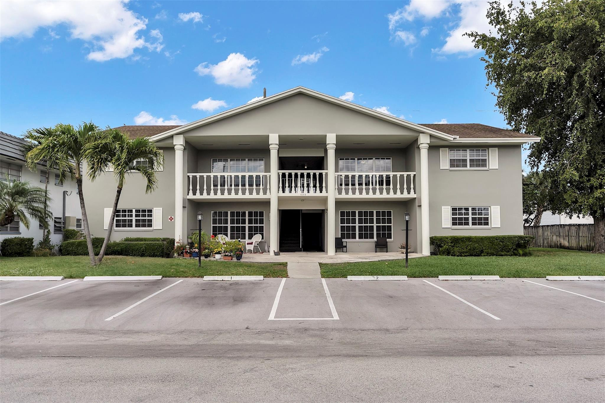 Large (1800 sq. ft ) two bedroom two bath plus den located in sought after Wilton Manors. This pristine boutique building only has four units. This second floor unit has: new hurricane impacted windows, stainless steel appliances, washer & dryer in unit,  tile throughout , granite counter tops, plenty of closet space and a large Florida room for either a den or office. Shared screen in patio in back and open balcony in front. Southern exposure with plenty of natural light. Quiet dead end street. Back yard has plenty of room for a barbecue. Pet friendly building no more than 20 lbs. 650 credit score. Quick approval. Close to highways,shops and beach. Two assigned parking spots and guest parking. If your looking for a lot of space and centrally located this is for you.