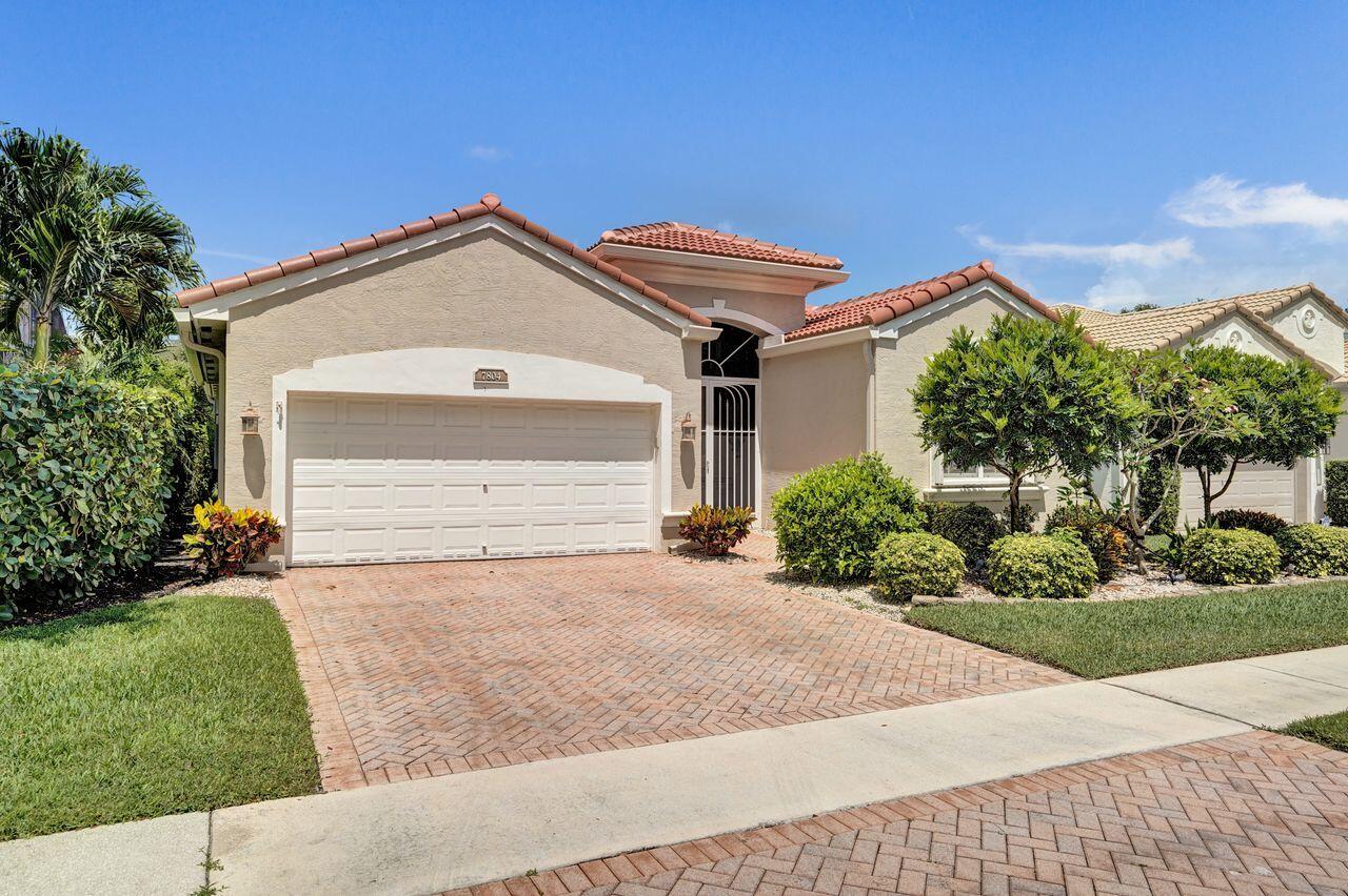 This lakefront home is a TRUE 3 BEDROOM + OFFICE and features a BRAND NEW ROOF and thoughtfully selected upgrades throughout. The double-door entry opens to a spacious great room with large diagonal tile flooring, a custom-built office, designed for dual use, and includes elegant wood built-ins. The home offers 11-foot ceilings with crown molding throughout. The kitchen is equipped with granite countertops, tile backsplash, an undermount sink, 42-inch wood cabinetry, and a large pull-out pantry. A bay window nook overlooks the lake and screened patio—ideal for breakfast, lunch and/or dinner dining. The expansive master suite includes wood flooring, two customized walk-in closets, and a well-appointed bathroom with dual sinks, a soaking tub, and a separate shower.  Additional features include accordion shutters, hurricane-impact protection on all but two windows, remote-controlled patio awnings, and a newer A/C system (approximately five years old).