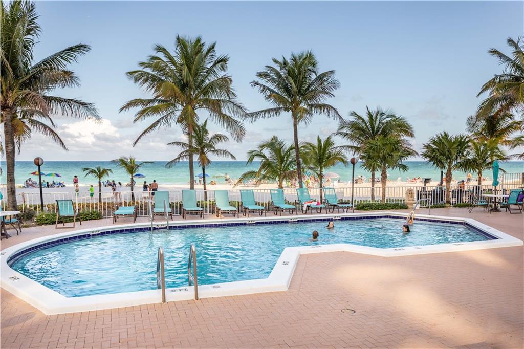 Impeccably remodeled unit ON THE BEACH in the best oceanfront building in Pompano. Fantastic split bedroom layout takes advantage of every single square foot. Spacious bedrooms, large closets, continuous marble tile throughout. No other building on the beach beats all these amenities! In-Unit full sized Washer/Dryer. Low HOA, 1 assigned in-garage space, ample guest parking, 24/7 security, fully staffed self-managed building, concierge service M-F 9a-5p, high speed internet, premium cable, car wash area, BBQ, pool, hot tub, sauna, oceanfront clubhouse w/kitchen, billiards, ping pong, bocce, bike parking. Financially solid, well managed building. Rentals OK after 1st year then 2X/yr 60day min. Furniture negotiable, art/electronics not included. Showings begin 2/15