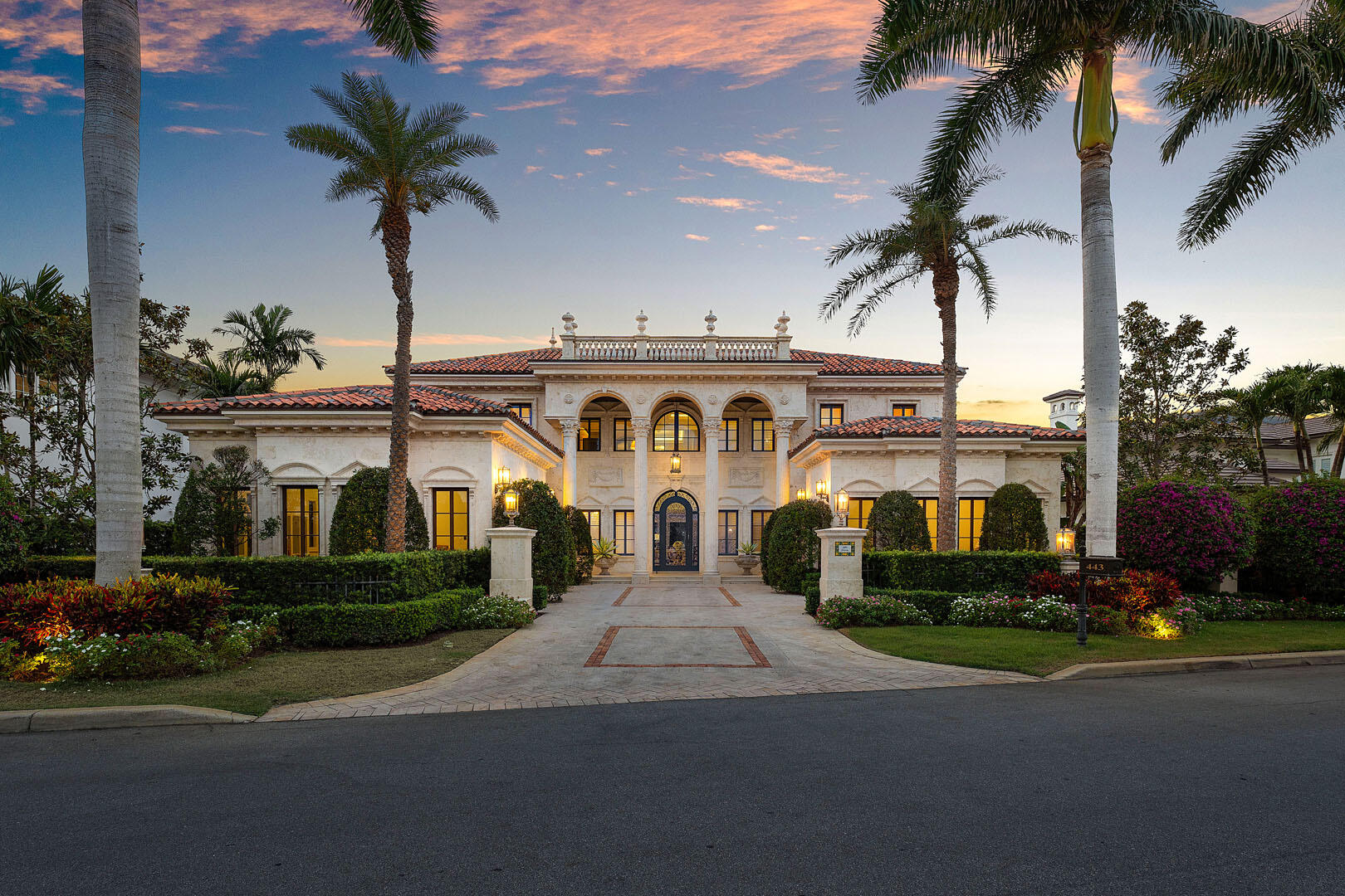 Villa Diassi is a waterfront work of art, nestled along the prestigious Buccaneer Palm Waterway with direct Intracoastal access. Designed for those who demand excellence, this five-bedroom residence, enhanced by a club room and private library, is a rare blend of timeless Venetian architectural distinction and coastal elegance. Sunlight pours over the estate's western-facing outdoor spaces, where a heated infinity-edge pool creates an exquisite setting for leisure and grand entertaining. A covered patio with retractable screens extends the home's indoor luxuries to the outdoors through vanishing sliding glass doors. At the heart of Villa Diassi, a gourmet kitchen impresses with dual center islands, premium appliances, and superior craftsmanship, setting the stage for inspired culinary pursuits. Upstairs, the primary suite is a private sanctuary featuring His & Her baths and dressing rooms, a morning bar, and a private balcony overlooking the serene waterway and pool.

Thoughtfully engineered for peace of mind and enduring comfort, the home has natural gas, a generator, an elevator, Lutron lighting, a yacht-ready dock, and impact glass, further enhancing Villa Diassi's uncompromised lifestyle.