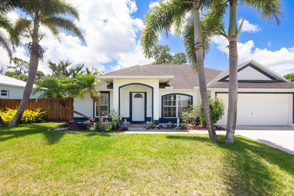Discover this charming single-story 3-bedroom, 2-bath home located in one of the area's most sought-after neighborhoods. Enjoy the convenience of being close to shopping, dining, schools, and major commuter routes, making this an ideal location for everyday living. Inside, the thoughtfully designed split floor plan offers privacy and comfortable living spaces with a functional flow throughout. The kitchen provides ample workspace and storage, while the primary suite is separate from the secondary bedrooms offering additional privacy. Two additional bedrooms offer flexibility for family, guests, or a home office. A spacious 2-car garage provides secure parking and extra storage. Whether you're a first-time buyer, downsizing, or investing, this home is a wonderful opportunity in a highly