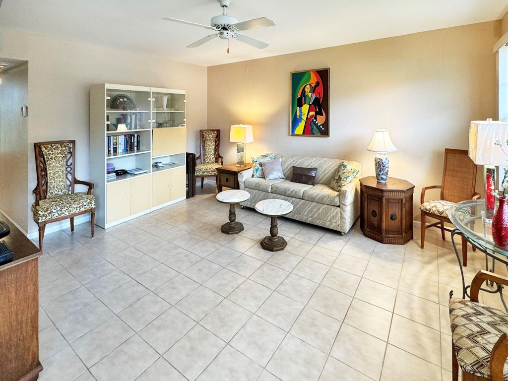 CONVENIENT 1st FLOOR CONDO IN A GREAT LOCATION!! WALK TO PLAZA & POOL & PARKING RIGHT IN FRONT! THIS 2 BED, 2 BATH IS READY FOR YOU TO MOVE RIGHT IN! FURNISHED W/CERAMIC TILE IN LIVING AREAS & COZY CARPET IN  BEDROOMS! KITCHEN FEATURES FORMICA COUNTERTOPS W/ EXTRA COUNTER SPACE & STORAGE! UPDATED GUEST BATH INCLUDES BEAUTIFULLY TILED SHOWER STALL, NEW VANITY & GRANITE COUNTERS!! THE PRIMARY BEDROOM'S WALK-IN CLOSET & CUSTOM BUILT IN STORAGE WILL WOW YOU!! ENCLOSED PATIO HAS AN EXIT DOOR TO THE GARDEN! AND THEN THERE ARE THE AMENITIES! CENTURY VILLAGE EAST INCLUDES A LAVISH CLUBHOUSE WITH A 1,500 SEAT THEATER, MOVIES, STATE OF THE ART GYM, PICKLEBALL & TENNIS, INDOOR & OUTDOOR POOLS, DANCES, CLASSES OF EVERY TYPE AND MORE!! CLOSE TO BEACH, SHOPPING & MAJOR HWYS! ASSOC CLAIMS 55+
