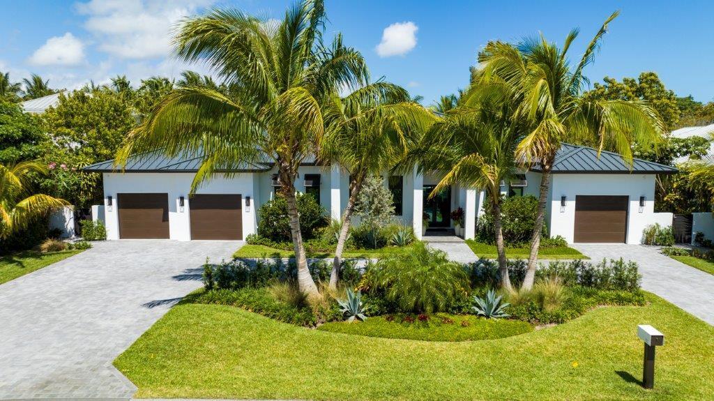 Built in 2022, this six-bedroom contemporary residence lives like new. Its open floor plan is ideal for entertaining and  the split-bedroom layout affords privacy. Features include a guest house, expansive loggia and large pool in the turf-carpeted back yard. Details include 12-foot-high ceilings, custom cabinetry, handsome wood and tile flooring, and garages with charging stations. Amenities include a metal roof, impact-glass windows and doors, automatic blinds, natural gas accommodation, four air-conditioners, two tankless hot-water heaters, an air-conditioned storage room, full Smart Home technology, Somfy remote screening in the outside loggia, outdoor lighting, an irrigation system, generator-ready with a pad and wiring, and large pool with auto-fill. LOCATION: 

501 Northwest 9th Street, Delray Beach, Florida. Minutes from the beach and vibrant downtown Delray Beach, the desirable Lake Ida neighborhood is a peaceful oasis centered on a picturesque lake offering boating and fishing. There are two lakefront parks, one home to the Delray Beach Playhouse.

PROPERTY: 
 
Inviting and welcoming, the brick-paved driveway and motor court set a great sense of arrival, and for outdoor entertaining, the expansive loggia, with a tongue-and-groove wood ceiling and Somfy remote screening, offers the opportunity for year-round outdoor living. Highlights here include a gas fireplace, built-in TV center and summer kitchen. Just adjacent is the salt-water pool, a spa and sun shelf, and also in the turf-carpeted back yard, with low-maintenance landscaping, is an outdoor shower.

RESIDENCE: 

Built in 2022, brimming with luxury and comfort, this chic six-bedroom, seven-bathroom, 7,081 +/- total-square-foot contemporary residence invites seamless indoor-outdoor living and entertaining. Decorator details include 12-foot ceiling heights, handsome wood-plank and tile flooring, beautiful custom cabinetry, and two gas fireplaces. With an open-floor-plan concept, expanses of glass windows and pocket sliding doors provide plenty of natural light as well as  beautiful views of the poolside loggia. The great room, a masterpiece of design, features a gas fireplace set off by a brick-faced mantel  and flanked by beautifully finished built-in credenzas. Two additional credenzas add charm, and one of them has a wet bar, perfect for serving guests during parties. The adjacent gourmet kitchen is fitted with custom cabinetry, quartz countertops and backsplashes, stainless Thermador appliances, 2 dishwashers, pantry, and a cook island that accommodates seating, another plus when entertaining. The primary bedroom suite, which accesses a private poolside covered terrace, is set apart for privacy. The suite comprises two large custom-fitted walk-in closets and a spa-inspired bathroom with a soaking tub, glass-enclosed multi-head shower, double vanities, make-up area, and water closet with a Toto toilet. In the opposite wing, there are four-guest bedroom suites, with one that offers pool-patio access and currently serves as a media room. A great perk for hosting overnight guests is the pool-view guest house with a bedroom suite and bar. Completing the layout is a beautifully finished office as well as attached garages with electric charging stations. Amenities include a metal roof, impact-glass windows and doors, automatic blinds, natural gas accommodation, four air-conditioners, two tankless hot-water heaters, an air-conditioned storage room, full Smart Home technology, outdoor lighting, an irrigation system, generator-ready with a pad and wiring, and pool with auto-fill. This contemporary residence, which masterfully combines gorgeous design with fine craftsmanship, is the perfect choice for those who enjoy entertaining and appreciate the finer things in life.
 

 


The information herein is deemed reliable and subject to errors, omissions or changes without notice.  The information has been derived from architectural plans or county records. Buyer should verify all measurements. 

DISCLAIMER: Information published or otherwise provided by the listing company and its representatives including but not limited to prices, measurements, square footages, lot sizes, calculations, statistics, and videos are deemed reliable but are not guaranteed and are subject to errors, omissions or changes without notice. All such information should be independently verified by any prospective purchaser or seller. Parties should perform their own due diligence to verify such information prior to a sale or listing. Listing company expressly disclaims any warranty or representation regarding such information. Prices published are either list price, sold price, and/or last asking price. The listing company participates in the Multiple Listing Service and IDX. The properties published as listed and sold are not necessarily exclusive to listing company and may be listed or have sold with other members of the Multiple Listing Service. Transactions where listing company represented both buyers and sellers are calculated as two sales. The listing company's marketplace is all of the following: Vero Beach, Town of Orchid, Indian River Shores, Town of Palm Beach, West Palm Beach, Manalapan Beach, Point Manalapan, Hypoluxo Island, Ocean Ridge, Gulf Stream, Delray Beach, Highland Beach, Boca Raton, East Deerfield Beach, Hillsboro Beach, Hillsboro Shores, East Pompano Beach, Lighthouse Point, Sea Ranch Lakes and Fort Lauderdale. Cooperating brokers are advised that in the event of a Buyer default, no financial fee will be paid to a cooperating Broker on the Deposits retained by the Seller. No financial fees will be paid to any cooperating broker until title passes or upon actual commencement of a lease. Some affiliations may not be applicable to certain geographic areas. If your property is currently listed with another broker, please disregard any solicitation for services. Copyright 2023 by the listing company. All Rights Reserved.