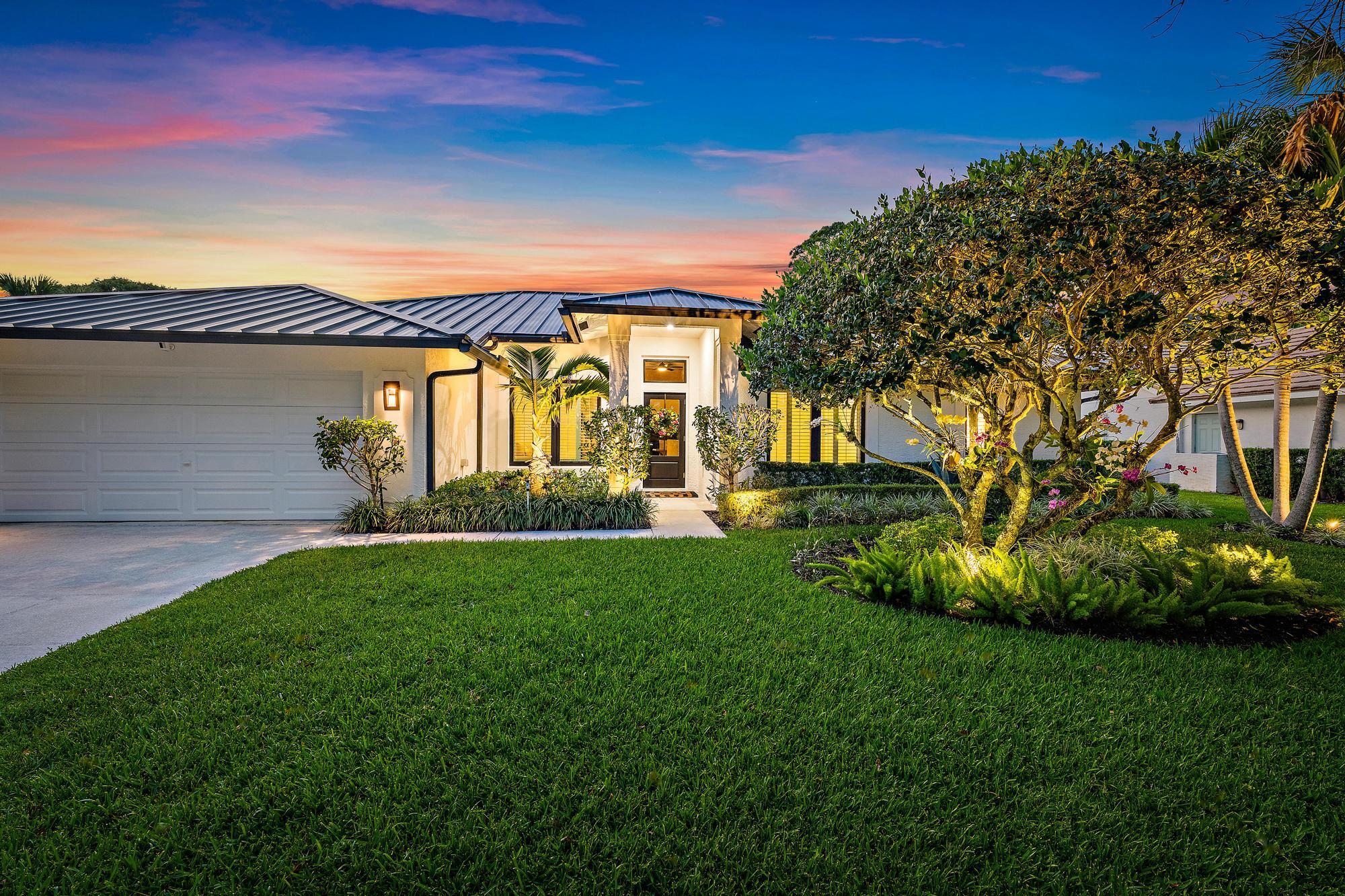 EXCEPTIONAL four bedroom, two bathroom pool home nestled within one of Jupiter's most desirable low HOA communities, The Shores. Beautifully updated and thoughtfully maintained, this residence offers the ideal blend of comfort and style with a screened pool patio, renovated bathrooms, a durable metal roof, hurricane impact windows, doors and garage door, newer kitchen appliances, and numerous major upgrades completed within the last few years. Step inside to a welcoming interior designed for easy everyday living and entertaining alike. From the moment you enter, you'll appreciate the bright and inviting living spaces, open flow, and seamless connection to the outdoor entertaining area. The heart of the home is the kitchen, featuring newer appliances and excellent functionality, all while overlooking the main living areas and pool views beyond. The primary suite offers a peaceful retreat with a spacious sitting area, perfect for a reading nook, home office space, fitness corner, or private lounge. The suite also features a beautifully renovated bathroom designed with modern finishes and comfort in mind, creating the perfect place to unwind at the end of the day. Three additional bedrooms provide flexibility for guest or a home office, or hobby space. The second bathroom has also been tastefully renovated, offering updated style and convenience for residents and visitors alike. Outdoor living is where this home truly shines. Enjoy Florida living year-round from the screened patio and pool area, creating the perfect setting for relaxing afternoons, weekend gatherings, or morning coffee in your own private backyard oasis. Additional upgrades add tremendous value and peace of mind, including a metal roof, whole house water purification system, newer pool equipment, 12-inch blown attic insulation for enhanced energy efficiency and comfort, and full hurricane impact protection for added security. Residents of The Shores enjoy a beloved neighborhood atmosphere with mature tree-lined streets, scenic lakes, and low HOA fees. This established community is known for its welcoming feel, beautiful surroundings, and strong sense of pride of ownership. Ideally located in Jupiter, you are just minutes from pristine beaches, top-rated dining, shopping, golf, parks, I-95, the Turnpike, and everything that makes Jupiter one of South Florida's most sought-after places to call home. Homes with this level of updates, value, and location do not last long. Schedule your private showing today before this opportunity is gone.