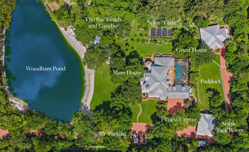 Welcome to Woodham Lodge a 9,727 sq'/14,314 total sq', 7 BR, 7 FB, Victorian Manor Home set on 5 acres. The .20 mile Chicago Brick Driveway winds past tranquil Woodham Pond & Tiki Bar/Beach Gazebo. Continuing by the Manor House and 3 Car attached garage, the road curves past the Fitness Center, Stable, Tack Room and Paddock, to a lovely 2 bedroom en-suite guest house with an oversized one car garage and screened porch. Woodham Lodge has ''a look'' because no details were overlooked, from the 18th Century Armoire that ''secretly'' opens into the stunning Master Suite, to the 478(+) bottle wine cellar and wall to wall hardwood, Italian marble, floors. The property features a 5-Star Lagoon Pool with, gas torch lights, water slide, grotto, fabulous outdoor kitchen, living and dining areas. The Stable is complete with, A/C Tack Room and paddock. The property is safe with CBS Construction, Impact Windows, Whole House Generator and Smart Technology. A Close to everything-South Florida location!