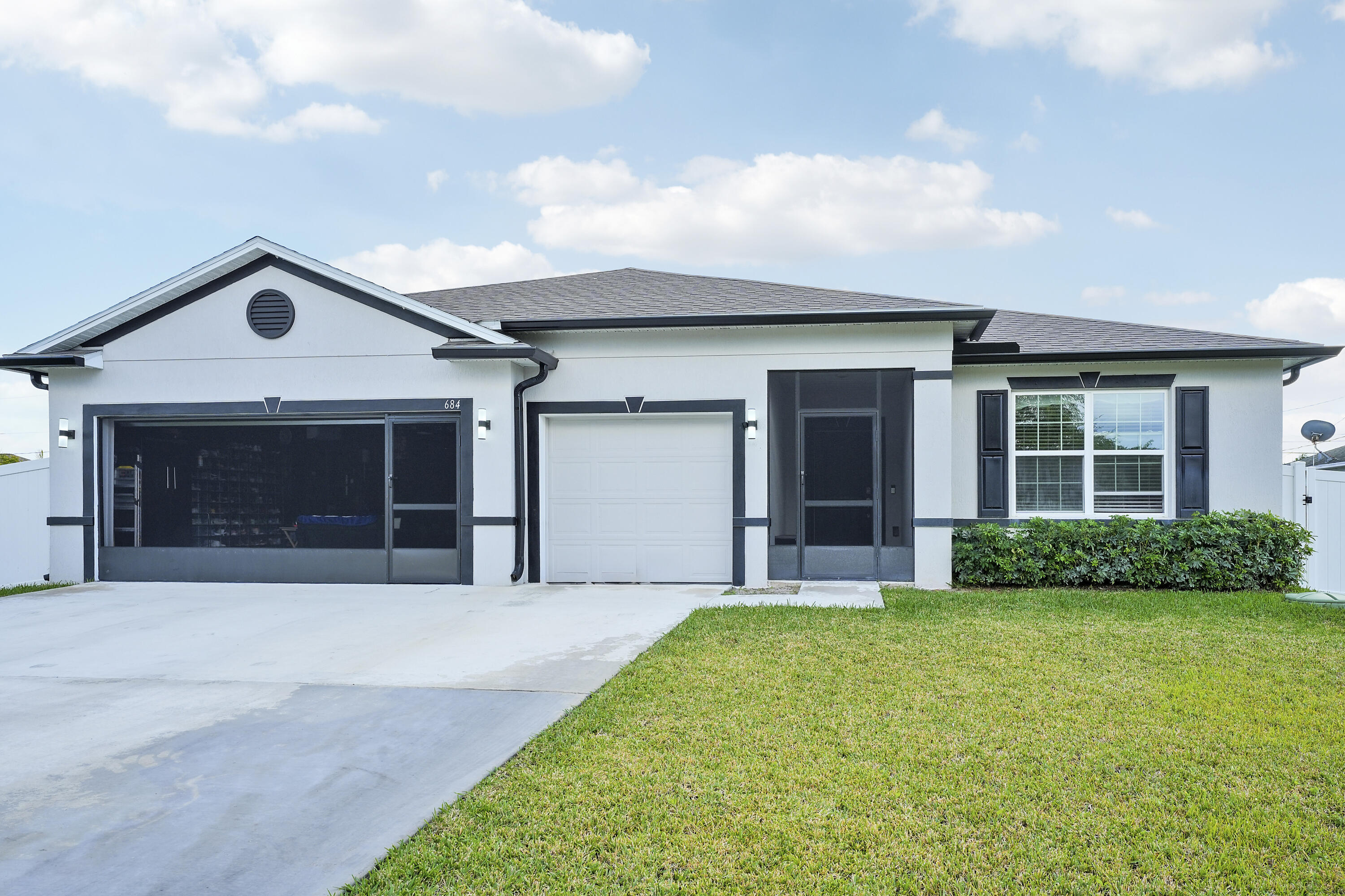 2024 Maranda Homes build featuring 4 bedrooms, 2 full bathrooms, and a 3-car garage with no HOA. This move-in-ready home offers quartz countertops, stainless-steel appliances, a spacious laundry room, and smart-home features including a smart thermostat, smart lock, and security cameras. Enjoy a fully fenced yard with room for a pool and hurricane-panel shutters for added protection. Conveniently located near major roadways, shopping, dining, parks, schools, and Port St. Lucie amenities.