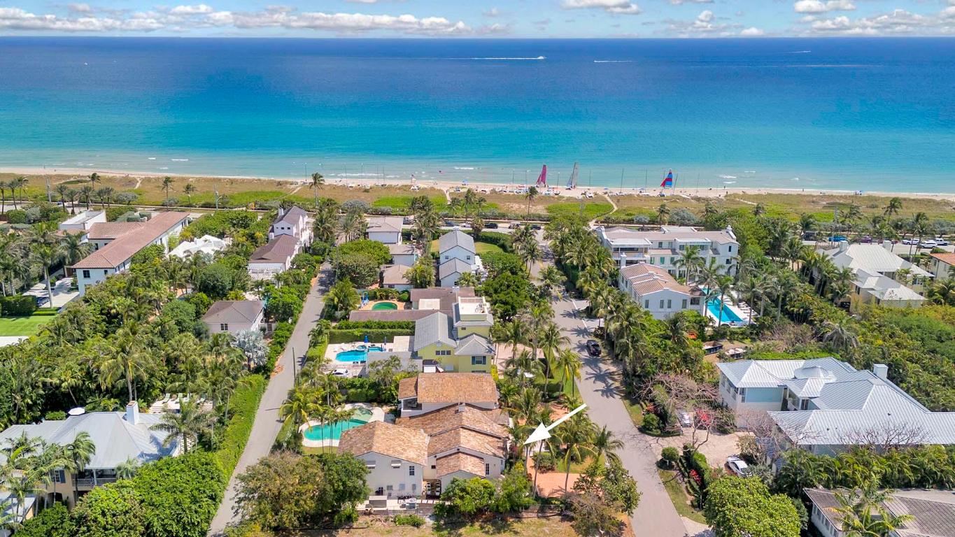 Discover an extraordinary opportunity at 1231 Seaspray Avenue, just three homes from the beach and half a mile from the vibrant Atlantic Avenue in Delray Beach. This stunning four bedroom, five bathroom estate features a brand-new kitchen, new shell reef flooring on the ground level, new built in bar with wine column, and a spacious open layout. The expansive backyard offers a sparkling pool and spa, ideal for entertaining or relaxing in privacy. Situated on an incredible 100' x 140' lot with dual access from both Seaspray Avenue and Beach Drive, this home combines the best of coastal living and convenience, offering a truly exceptional lifestyle just steps from the ocean.
