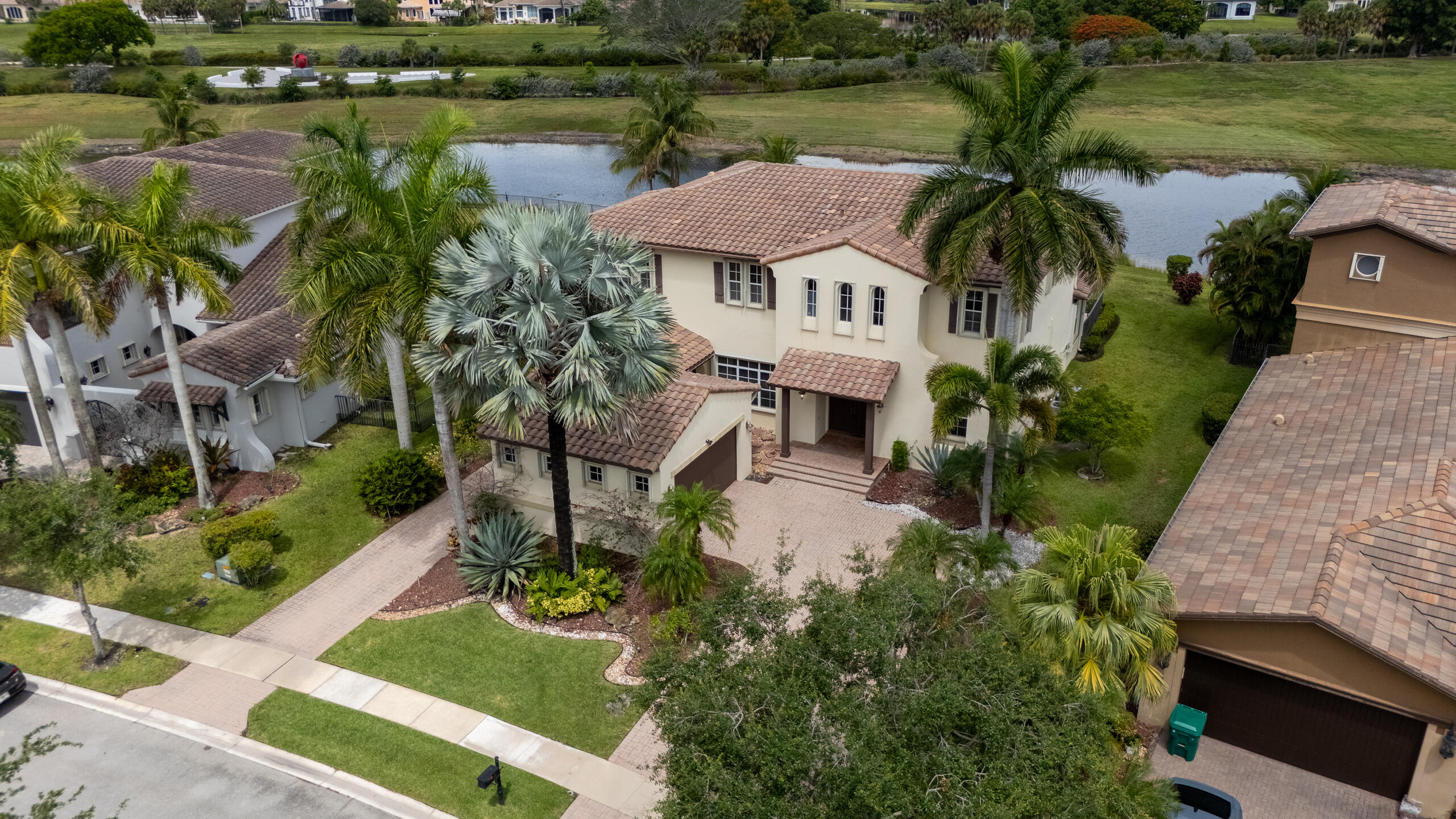 Great opportunity for this 4-bed, 4.5-bath home in the desirable Edgewood community of Heron Bay. Boasting a huge chef's kitchen with a butler's pantry, formal dining area, formal living room, and a great room that opens to beautiful views of the in-ground pool and open landscape. 1st floor includes an in-law suite, perfect for guests or extended family. On the second floor, you will find a dedicated laundry room and three additional bedrooms, including a massive primary suite complete with a butler bar, twin walk-in closets,  bathroom with a soaking tub, and a large private balcony. The second floor also features an expansive extra room that is large enough  to easily convert into a fifth bedroom. An excellent opportunity for those seeking a spacious residence in an established community. 4-bedroom, 4.5-bathroom residence in the highly desirable Edgewood community of Heron Bay. Featuring 4,267 square feet of living space under air, the home boasts a huge chef's kitchen with a butler's pantry, a formal dining area, a formal living room, and a great room that opens to beautiful views of the in-ground pool and open landscape. [1] The first floor includes a convenient in-law suite, perfect for guests or extended family. On the second floor, you will find a dedicated laundry room and three additional bedrooms, including a massive primary suite complete with a butler bar, twin walk-in closets, a spa-like bathroom with a soaking tub, and a large private balcony. The second floor also features an expansive room that is large enough to easily convert into a fifth bedroom. Complete with a 1-car attached garage and a standalone 2-car garage structure, this well-proportioned home presents an excellent opportunity for those seeking a spacious residence in an established community.