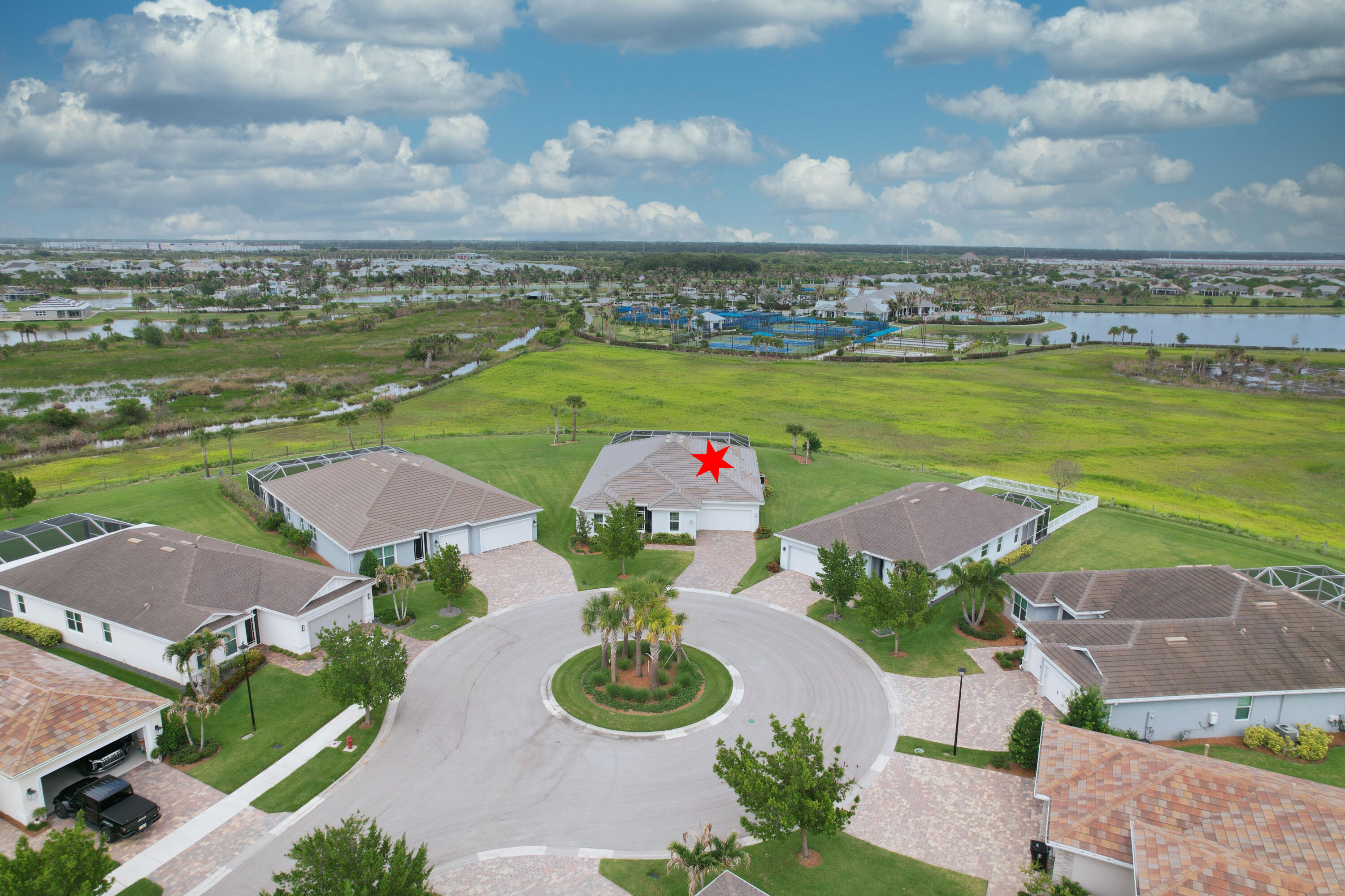 Welcome home to this modern, bright, move-in ready Reverence model in Del Webb at Tradition! Set on an oversized .39-acre cul-de-sac lot, this exquisite pool home offers nature preserve views, privacy and space. Its open floor plan has 3 bedrooms, flex room or 4th bedroom, 3 full baths, neutral tile, impact windows and doors, gourmet kitchen, upgraded cabinetry, quartz counters, large walk-in pantry, huge center island and more. Enjoy an outdoor oasis with extended covered lanai, picture-frame screen enclosure, travertine deck, and custom heated pool with cabana bath. 55+community with resort-style amenities   and the ultimate Florida lifestyle.