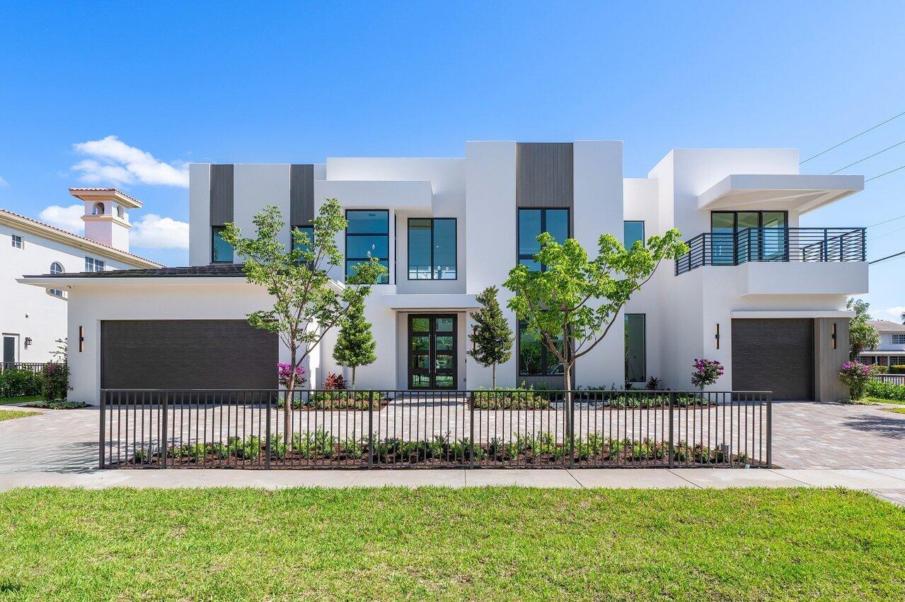 Welcome to your luxurious dream home, a masterpiece of modern design and impeccable craftsmanship, situated in the prestigious neighborhood of Boca Raton.  This brand-new construction, scheduled to be completed May of 2024, offers an unrivaled location behind Mizner Park, providing you with a vibrant lifestyle and convenient access to the stunning beaches just steps away. As you approach this architectural gem, you'll be captivated by its striking contemporary façade, blending harmoniously with the surrounding lush landscape.  Step inside and prepare to be amazed by the seamless fusion of elegance and functionality throughout the home's generous living space. Every aspect of this residence has been meticulously planned to provide the utmost comfort and style.  The open concept floor plan effortlessly integrates the living, dining, and kitchen areas, creating a perfect space for both intimate family gatherings and grand entertaining.  The abundant natural light cascading through the large windows creates an inviting ambiance, while the high ceilings amplify the sense of spaciousness. The state-of-the-art kitchen is a chef's delight, featuring top-of-the-line appliances, custom cabinetry, and a center island with a breakfast bar.  Whether you're hosting a formal dinner party or preparing a casual meal, this culinary haven will exceed all expectations. The first level of the home features two expansive rooms that offer versatile functionality, serving as either a spacious home office or an inviting clubroom for entertaining guests. The master suite is a true sanctuary, offering a serene retreat from the outside world.  Pamper yourself in the luxurious en-suite bathroom, complete with dual vanities, a soaking tub, and a walk-in shower.  The suite also features a spacious walk-in closet, providing ample storage space for your wardrobe.  Additional bedrooms are generously sized, each with its own en-suite bathroom, offering privacy and comfort for family members or guests.  A dedicated home office provides the perfect environment for remote work or study. Step outside onto the expansive patio area, where you can bask in the Florida sunshine or entertain guests in style.  The sparkling swimming pool beckons for a refreshing dip, while the landscaped gardens offer a peaceful oasis for relaxation. With its prime location, this home provides unparalleled convenience.  Mizner Park, renowned for its upscale shopping, dining, and cultural attractions, is just a stone's throw away.  The pristine beaches of Boca Raton are within walking distance, allowing you to indulge in sun-soaked days and breathtaking ocean views. Don't miss this incredible opportunity to own a brand-new constructions home in one of Boca Raton's most coveted locations.  Embrace the ultimate coastal lifestyle and experience the epitome of luxury living.
