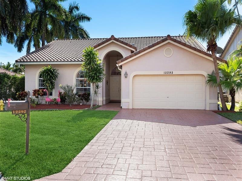 COME HOME TO PARADISE IN THE ISLES OF WEST GLEN! THIS MAJESTICALLY SITUATED HOME SITS IN A CULDESAC ON THE STRANAHAN RIVER OF CORAL SPRINGS WITH BOATING PERMITTED! OPEN FLOOR PLAN ENABLES ROOM TO ROAM! BEAUTIFULLY UPGRADED KITCHEN AND GUEST BATH BOAST GRANITE COUNTERTOPS & EXTRAORDINARY ARTISAN CREATED WOOD CABINETRY WITH PULL OUT DRAWERS, PANTRY AND EXTRA STORAGE! THIS HOME HAS ALL THAT A FAMILY COULD DESIRE INCLUDING WATER VIEWS AND THE ABILITY TO KYAK, FISH AND BOAT IN YOUR OWN BACKYARD! HUGE LANIA HAS PLENTY OF ROOM FOR A POOL, TOT LOT & GARDENS. PRIMARY BEDROOM OVERLOOKS TRANQUIL WATER VIEWS. NEW A/C, NEW HOT WATER HEATER, LOW HOA, PETS & ALL AGES WELCOME! CLOSE TO GREAT SCHOOLS, HOUSES OF WORSHIP AND SAWGRASS EXPRESSWAY. OPEN HOUSE SUNDAY DEC 5, 2021 1-4PM! HOMEOWNERSIP AWAITS!
