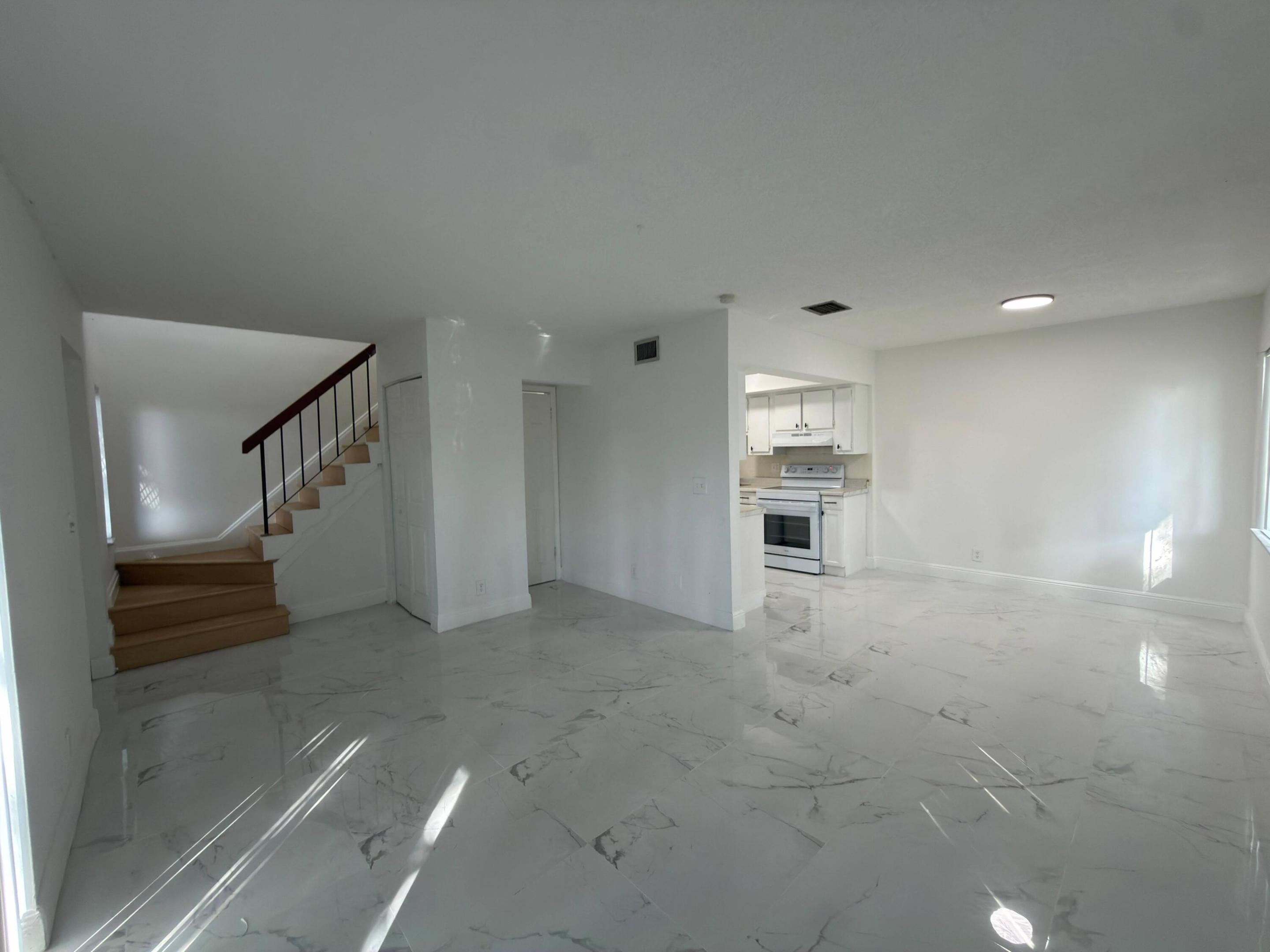 Well Maintained and new tile floor! 2-bedroom, 1.5-bath condo featuring a functional layout with appliances included. Spacious master bedroom located upstairs with ample closet space. Bright living areas and a convenient half bath on the main level make this home ideal for comfortable living or investment. The condominium association has received official documentation confirming the building has passed its 40-year recertification." Rules and Regulation, and Condo Application, Approved budget 2026 and inspection final report 40 years certification are located in the supplements.