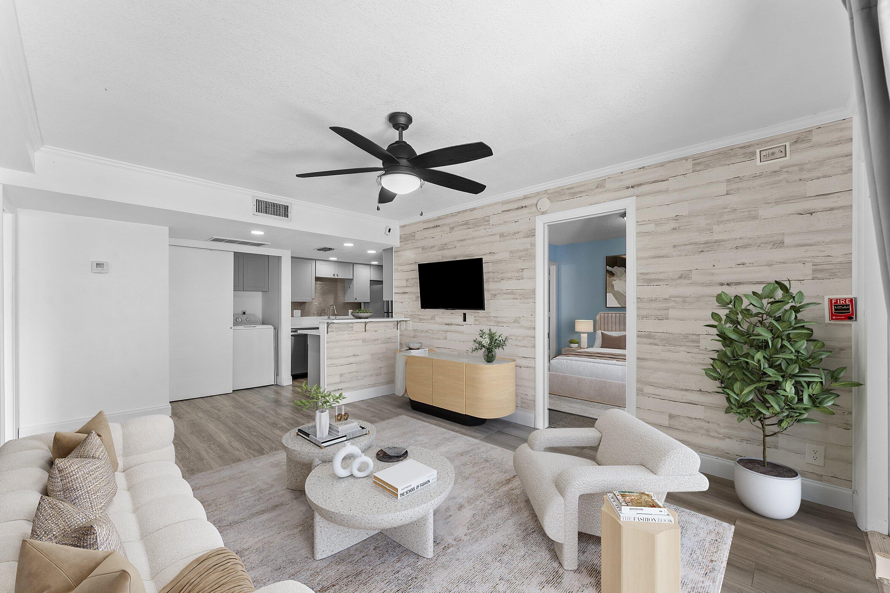 Don't miss this exceptional opportunity to own a beautifully updated condo in the heart of West Palm Beach. Perfectly situated just minutes from Tanger Outlets, Downtown West Palm Beach, Palm Beach International Airport, world-class shopping, dining, and pristine beaches, this centrally located residence offers the ideal blend of convenience and lifestyle. The renovated kitchen features contemporary cabinetry, quartz countertops, and newer stainless steel appliances. This spacious 2-bedroom, 2-bathroom condo offers a desirable split-bedroom floor plan, in-unit washer and dryer, private patio, and accordion hurricane shutters for added peace of mind.  Whether you're looking for a primary residence, seasonal retreat, or investment property, this unit is ready to meet your needs with immediate rental eligibility. Residents of Lake Place enjoy resort-style amenities including a community pool, fitness center, tennis courts, and clubhouse. As an added bonus, the seller is offering a contribution toward six months of HOA fees, making this an even more attractive opportunity
