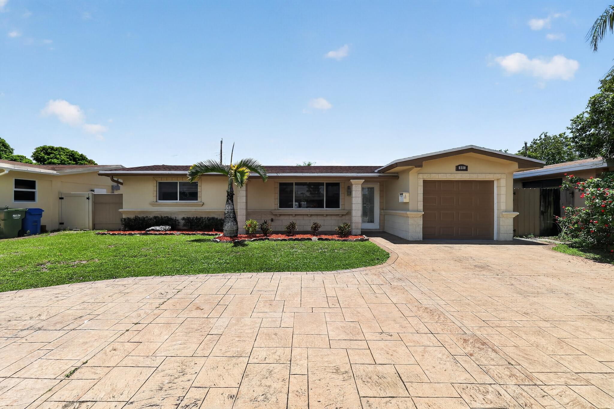 A well-located single-family home offering 1,579 square feet of comfortable living on a 6,001 square foot lot with no HOA fees. The home features 3 bedrooms and 2 full bathrooms, a recently updated kitchen with stainless steel appliances, a covered patio in the backyard perfect for outdoor entertaining, and a dedicated laundry room off the garage. Conveniently located near schools, Memorial Hospital Pembroke, CB Smith Park, shopping, dining, and major universities, with easy access to both Fort Lauderdale/Hollywood and Miami International airports.