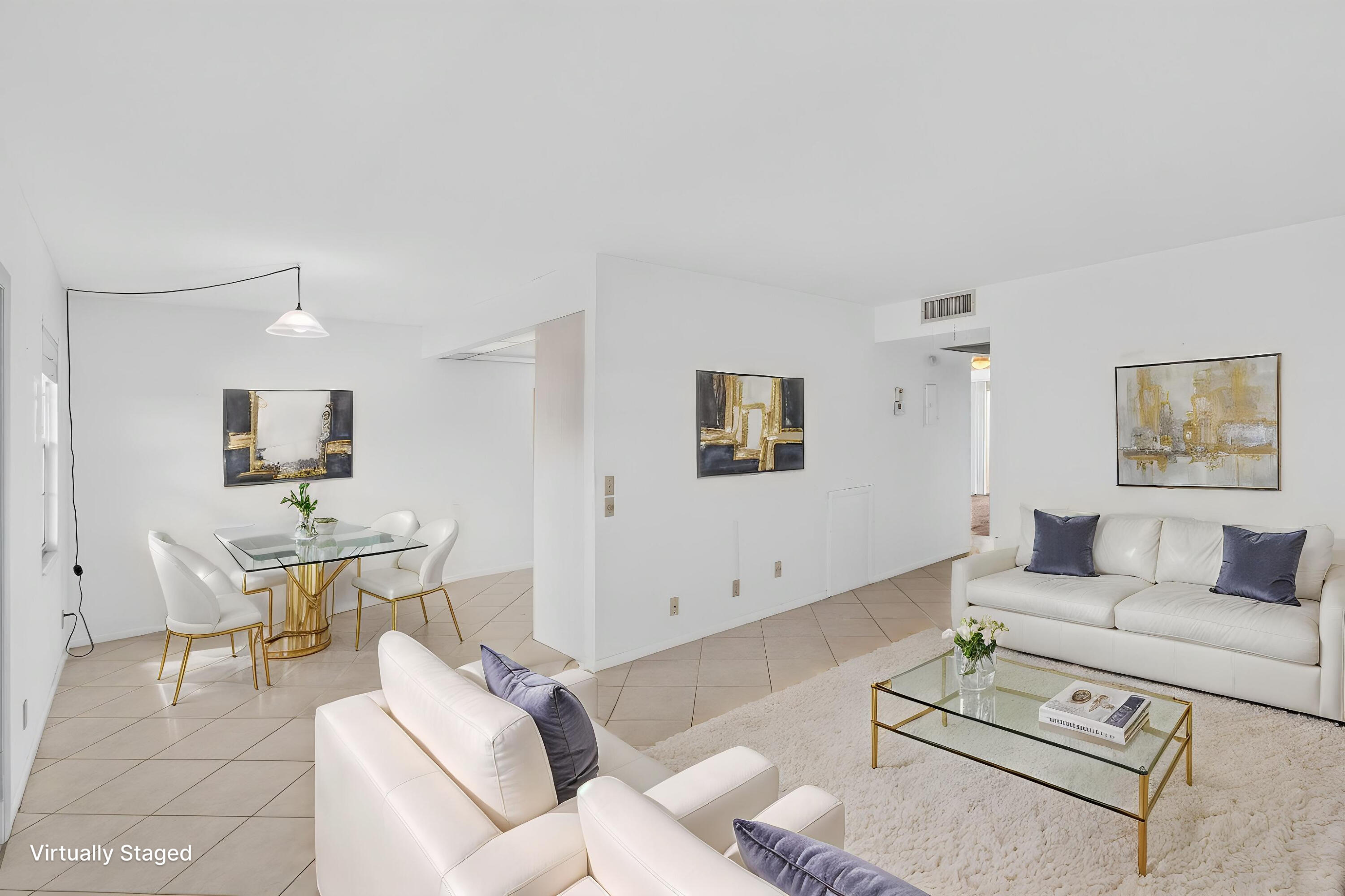 CENTURY VILLAGE, BOCA RATON--SUPER ACTIVE ADULT COMMUNITY.   The Hythe section is highly desirable for investors and buyers seeking additional income, as you can rent out the condo immediately upon purchase.  Unveiling an elevated condominium experience at 4039 Hythe C, Boca Raton, FL, a marriage of gracefulness, functionality, and calm in one package. This top-floor unit radiates a warm, welcoming aura. A stone's throw from a tranquil lake, the location offers an unparalleled refuge from the hustle and bustle of everyday life. This setting not only augments the condominium's inherent allure but also enriches its value proposition. Step into a thoughtfully designed kitchen featuring a double sink and ample countertop space, ensuring your culinary endeavors are nothing short of joyous.  Enjoy your morning brew in the custom-built breakfast nook, adorned with matching countertops, for a cheerful start to your day.  Further into the home, a commodious master bedroom greets you. Furnished with a spacious walk-in closet, en-suite bathroom complete with a unique step-down shower, an additional linen closet for storage, and a pocket door providing utmost privacy.  Adding to the condo's charm is the well-proportioned guest bedroom, equipped with a sizeable closet and smooth sliding doors leading onto the welcoming patio. An efficiently stocked guest bathroom furnishes the abode with a handy shower/tub combination.  The condominium's outdoor space is a serene patio with tiled flooring. This calming setting is the perfect spot to relish tranquil mornings or engaging evenings.  The ease of parking directly in front of the unit complements the litany of advantages this top-floor condo offers. In summation, 4039 Hythe C, Boca Raton, FL, is a top-floor condominium that masterfully blends comfort, elegance, and security. The well-thought-out layout makes it an irresistible choice for those seeking a delightful lifestyle in one of Florida's most captivating cities. Don't miss this exceptional opportunity.  Carefully designed spaces make it an enviable choice for a delightfully engaging lifestyle in one of Florida's most interesting cities. Don't let this unique opportunity pass you by. Century Village offers many amenities, including a clubhouse with a fitness studio, a bus service, social spaces, and a performance theater. Residents can also enjoy activities with 12 tennis courts, 12 shuffleboard courts, pickleball courts, and bocce ball courts. The motivated seller presents this excellent opportunity for interested buyers.   THE TOTAL MONTHLY HOA IS $ 731.77 (MONTHLY HYTHE SECTION HOA - $424.23 and, MONTHLY CEN-WEST HOA - $307.54, MONTHLY)----WATER, BASIC CABLE, AND INTERNET ARE INCLUDED.   RENTABLE IMMEDIATELY AFTER PURCHASE, WITH A MINIMUM OF 4 MONTHS.