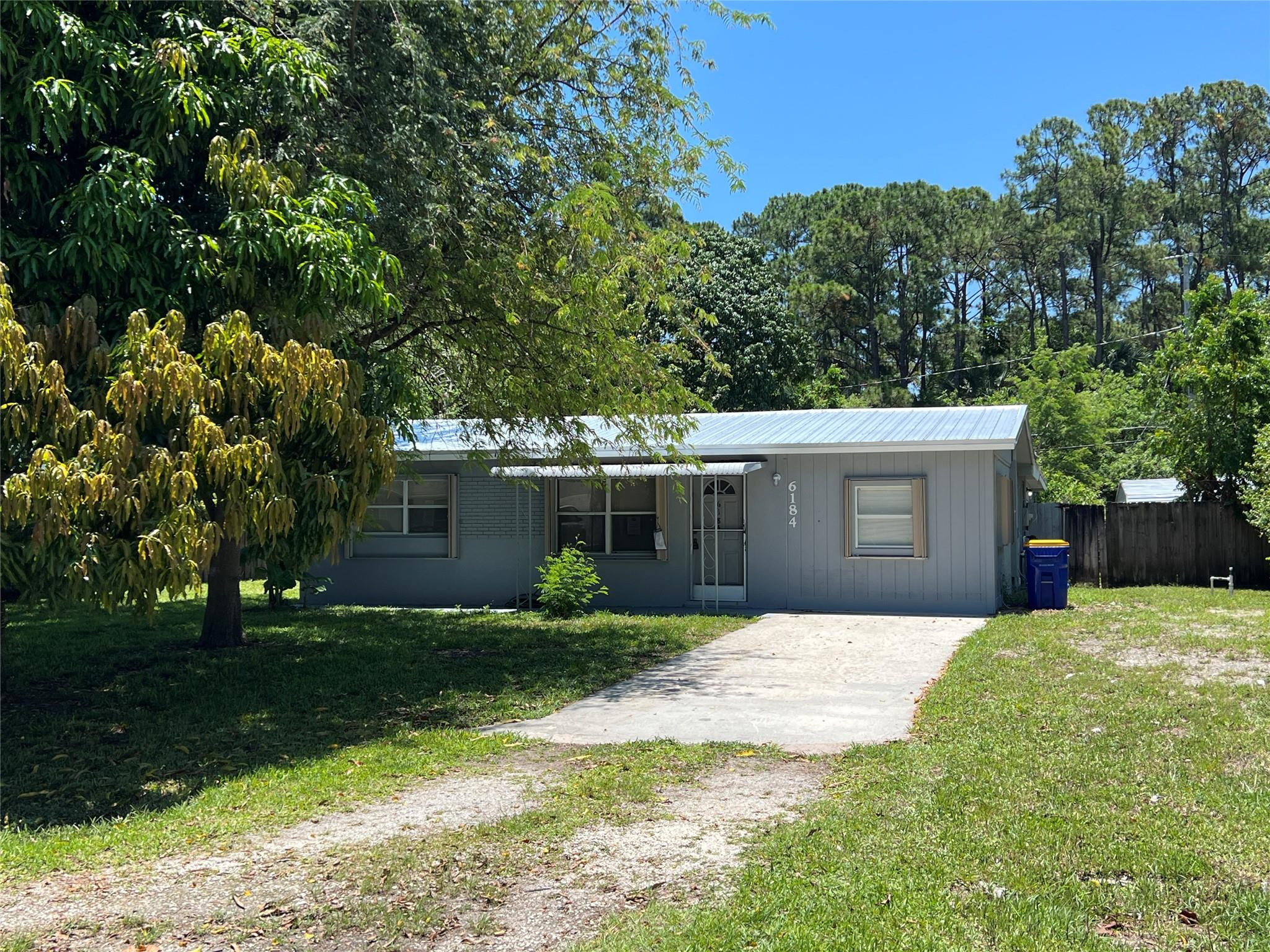 JUST REDUCED!! THIS 4/2 SPACIOUS HOME IN POINCIANA GARDENS COMMUNITY LOCATED IN HOBE SOUND, FL. NO HOA, NEW ROOF, TILE THROUGHOUT, SPACIOUS BACKYARD WITH STOARGE SHED AND PLENTY OF PARKING FOR YOUR RV'S AND BOATS.  SELLER HAS NO DISCLOSURE OR HAS NEVER OCCUPIED THIS PROPERTY. SEE ATTACHED SELLERS ADDENDUM.