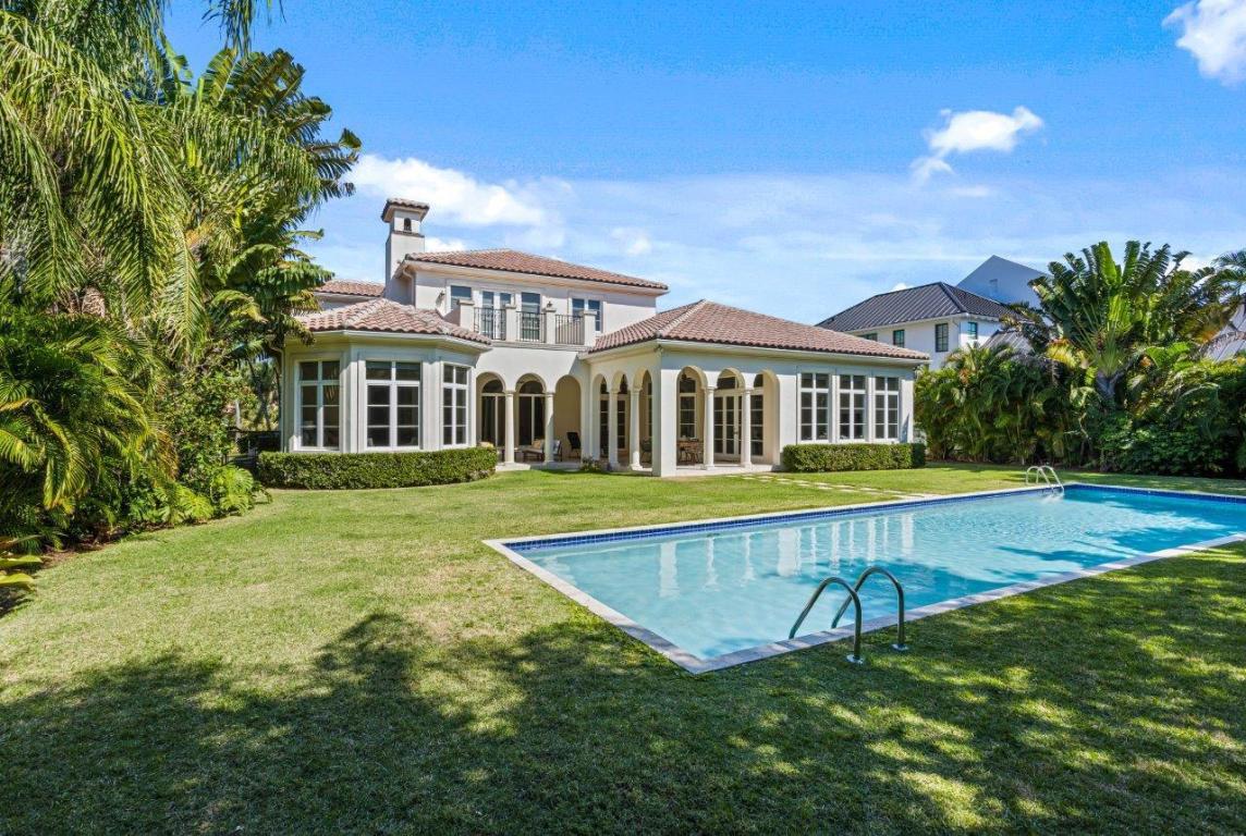 Luxe updated Ocean Ridge estate, in a beautiful parklike setting close to the beach, features an expansive fenced backyard with a large pool and pretty gardens. This chic residence offers elegant formal rooms, paneled office, and great family room/kitchen area. The primary suite is located on the first floor. New designer details include a completely renovated powder room, decorator lighting, Tesla Charger, and motorized shades. The information herein is deemed reliable and subject to errors, omissions or changes without notice.  The information has been derived from architectural plans or county records. Buyer should verify all measurements. LOCATION: 

Ocean Ridge, Florida:  One of the Gold Coast's best-kept secrets, Ocean Ridge is prized for its tranquility, relaxed ambiance, and unspoiled barrier island beauty nestled between the Atlantic Ocean and Intracoastal Waterway.

PROPERTY: 
 
Private, parklike and peaceful on a large lot just one block to the ocean and the Ocean Ridge Park, a columned loggia overlooks the pool, set within a green-carpeted lawn, offering indoor/outdoor opportunities for relaxed family living and gracious entertaining.

RESIDENCE:

Exuding elan and elegance, this updated European-inspired Mediterranean-style gem, with five bedrooms and 7,462 +/- total square feet, features many designer details that include soaring 12-foot-high ceilings, wood and Saturnia marble flooring, and fine-crafted trim-work. A beautiful welcoming sequence is achieved at the entry, where double wood doors open to the elegant two-story reception room, with a wrought-iron embellished stairway, which flows out to the formal living and dining rooms. A highlight in the living room is the elegant gas fireplace with a wood mantel and a set of floor-to-ceiling arched windows overlooking the pool, while in the dining room, French doors access the poolside loggia. The richly paneled office is finished with built-in bookcases, wood-plank floors, a coffered ceiling, and arched garden-view windows. For more informal living, the cook's-island kitchen, with a breakfast nook and eat-at bar connections to the pool-view family room for easy service, is finished with custom wood cabinetry, granite countertops, tile backsplashes, high-end appliances, a large food pantry, and butler's pantry. The primary suite is located on the first floor. Details in the bedroom include wood -plank flooring, a cove ceiling, large pool-view windows, and a French door that open to the loggia. The suite comprises two large custom-fitted walk-in closets and a spa-inspired granite-and-marble-finished bathroom with a spa tub, walk-in shower, double vanities and two water closets. Four guest bedrooms preside over the second floor, with one that can serve as a primary suite or VIP suite, with an ensuite bathroom, sitting room, and French doors that open to the pool-view balcony. Completing the layout are a laundry room, completely renovated powder room, large storage areas, and attached two-car garage with a new Tesla car charger. Other features include propane gas, Kohler generator, impact windows and doors throughout, two Carrier air conditioners, Beam central vacuum system, LED lighting, and an osmosis-system water purifier in the kitchen. New improvements include Minka Lavery exterior light fixtures, Thomas O'Brien interior lighting, designer ceiling fans, and decorator motorized solar shades.


DISCLAIMER: Information published or otherwise provided by the listing company and its representatives including but not limited to prices, measurements, square footages, lot sizes, calculations, statistics, and videos are deemed reliable but are not guaranteed and are subject to errors, omissions or changes without notice. All such information should be independently verified by any prospective purchaser or seller. Parties should perform their own due diligence to verify such information prior to a sale or listing. Listing company expressly disclaims any warranty or representation regarding such information. Prices published are either list price, sold price, and/or last asking price. The listing company participates in the Multiple Listing Service and IDX. The properties published as listed and sold are not necessarily exclusive to listing company and may be listed or have sold with other members of the Multiple Listing Service. Transactions where listing company represented both buyers and sellers are calculated as two sales. The listing company's marketplace is all of the following: Vero Beach, Town of Orchid, Indian River Shores, Town of Palm Beach, West Palm Beach, Manalapan Beach, Point Manalapan, Hypoluxo Island, Ocean Ridge, Gulf Stream, Delray Beach, Highland Beach, Boca Raton, East Deerfield Beach, Hillsboro Beach, Hillsboro Shores, East Pompano Beach, Lighthouse Point, Sea Ranch Lakes and Fort Lauderdale. Cooperating brokers are advised that in the event of a Buyer default, no financial fee will be paid to a cooperating Broker on the Deposits retained by the Seller. No financial fee will be paid to any cooperating broker until title passes or upon actual commencement of a lease. Some affiliations may not be applicable to certain geographic areas. If your property is currently listed with another broker, please disregard any solicitation for services. Copyright 2023 by the listing company. All Rights Reserved.