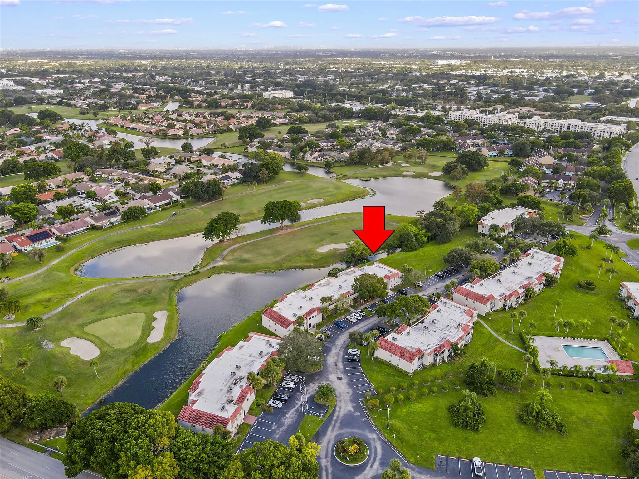 PRICE REDUCED!! See This Spacious 3-Bedroom/2-Bath Unit in the Serene Community of Cypress at Woodmont Boasting Tranquil Water and Golf Course Views from a Screened Patio, this First-Floor End-Unit Offers a Peaceful Retreat Ideal for all Ages. Step into the Modern Kitchen Outfitted with Updated Appliances. Enjoy the Convenience of a New Refrigerator, New Full-Size Washer, and the Comfort of a Newly Installed Air-Conditioning System. With Tile Flooring Throughout, this Home Combines Elegance with Easy Maintenance. One Assigned Parking Space, Ample Open Guest Parking, Community Pool, and So Much More! Ideally Located, Providing Quick Access to Nearby Shopping, Services, Schools, the Sawgrass Expressway and Florida Turnpike. Don't Miss the Opportunity to Make This Your Dream Home Today!!