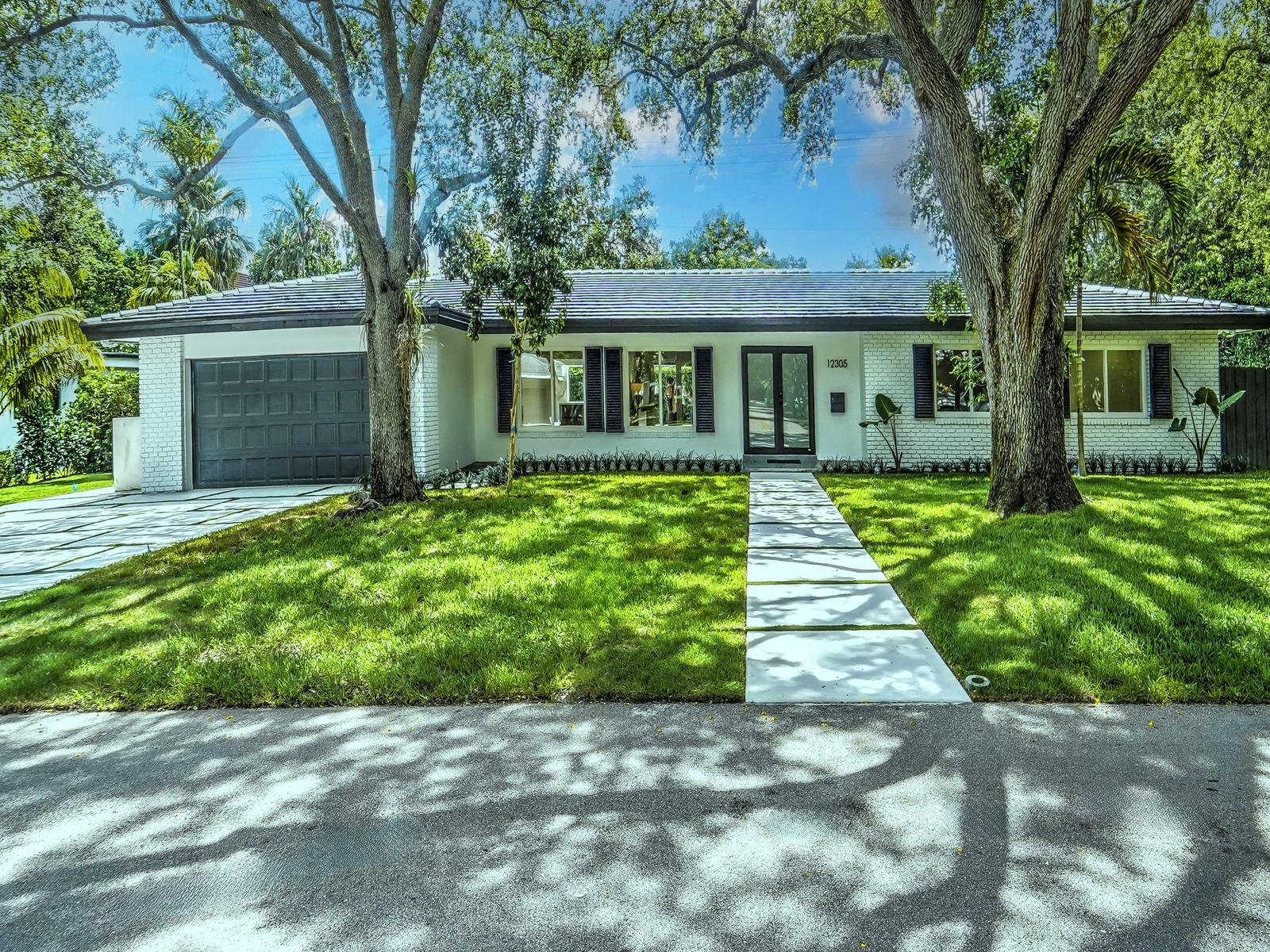 Welcome to this exceptional single story residence in Pinecrest.This fully renovated home offers 2,408 square feet of finished living space across 4 generous bedrooms and 3.5 bathrooms. The en-suite primary bedroom features a spa-like bathroom and opens to a large outdoor living space with fully equipped summer kitchen and big pool with new saltwater filter. Light-filled, open concept living spaces feature: Italian porcelain flooring, Italian kitchen cabinets with Dacor fridge, wine cooler and GE Profile appliances. New roof with 20 years guarantee, new plumbing, new electrical, new AC ducts, new impact windows and doors, new bathrooms and plenty of closet space. Enjoy year-round outdoor living & entertaining in this stunning home with a 2 car garage and plenty of parking space. A+ schools A school at walkable distance a true Oasis, close to the best the city has to offer.