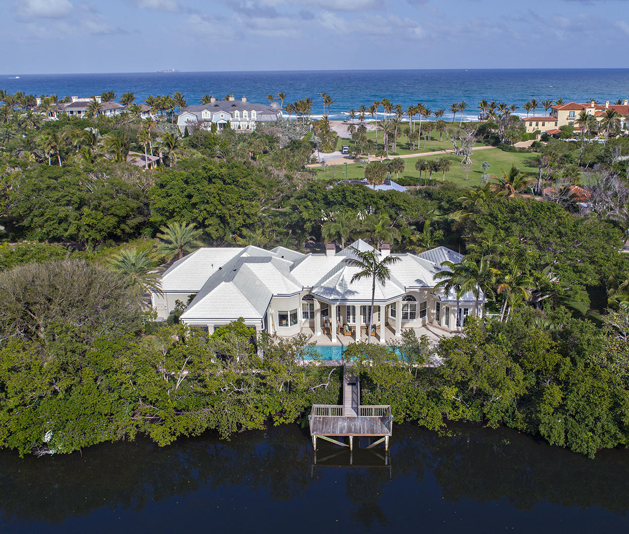 This one is a gem. Offered furnished with some exclusions. Pride of ownership apparent at every turn. Located on Banyan Road one of the finest streets in the county. Short walk to beach access. 
Kitchen family room opens to screened porch for dining. Formal dining room and living room exquisitely appointed, overlooks the covered loggia, pool and dock. Two beautifully appointed guest suites with private bath offer privacy for family and guests. Bring that buyer that is hard to please, this home is exceptional.