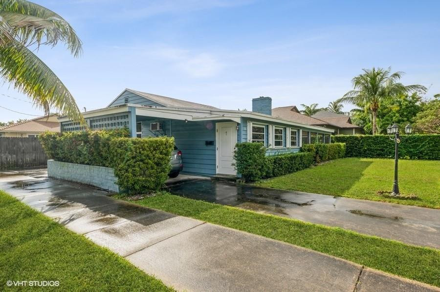 Come check out this super charming historic home centrally located in Old Pompano. A block from Kester Park. This home sits on a lot and half and features 3 bedrooms and 2 baths w a pool and a carport. Vaulted ceilings in family room with a wood burning fire place. Original wood flooring is in great condition in dining and two bedrooms. (Possibly an old Kester Cottage) Older kitchen and baths to make your own. Impact windows being installed soon. Needs central AC, has wall units. New washer/dryer. Large shed in back yard. Pool is deeper than average pool. 3/2 pool home