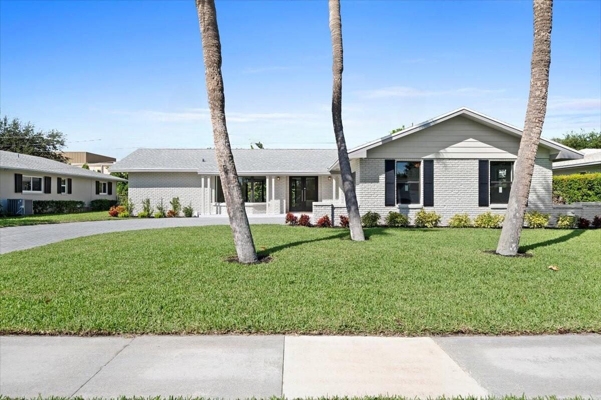 Discover unparalleled luxury in the highly sought-after Hidden Key - Gated and No HOA - neighborhood, where serene living meets the convenience of a prime location. Perfectly nestled across from the Intracoastal Waterway and just moments from pristine beaches, this pool home offers the ultimate Florida lifestyle. With shopping, dining, and the renowned JD McArthur State Park just around the corner, you're at the heart of it all. Step inside this beautifully updated residence and prepare to be impressed. A brand-new roof crowns the home, while impact doors and windows provide both safety and style. The centerpiece of the home is the expansive gourmet kitchen, reimagined with sleek stainless steel appliances, stunning quartz countertops, and ample space to fuel your culinary creativity. Each bedroom has been thoughtfully designed as a personal oasis, combining modern elegance with cozy tranquility. The attention to detail continues outdoors, where you'll find a professionally landscaped yard, a newly installed heated saltwater pool, and a private retreat perfect for entertaining or relaxing.

This is more than just a houseit's your own slice of paradise. Schedule your private tour today and start living the life you've always dreamed of in North Palm Beach!