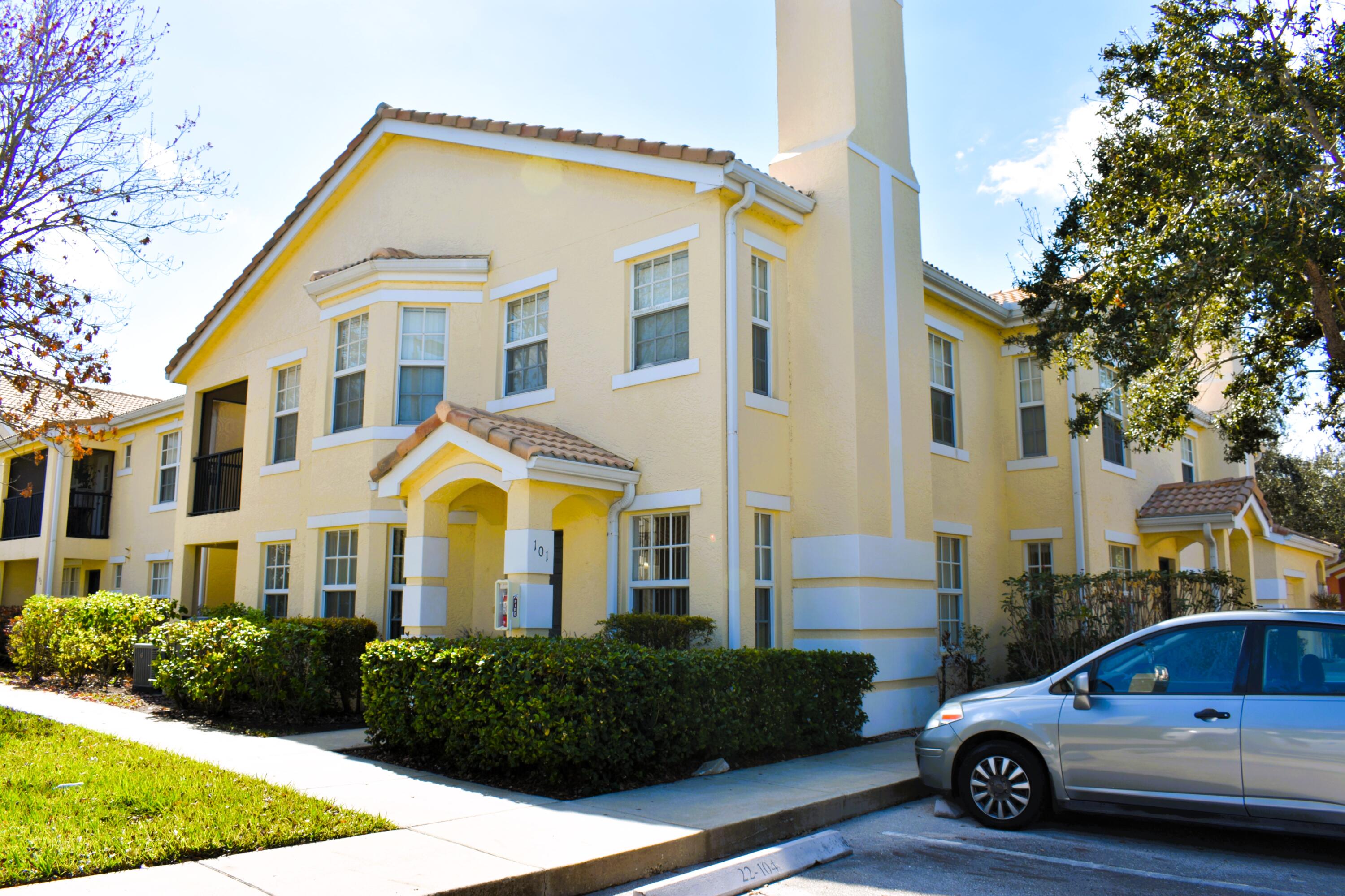 Great 3 Bedroom Corner Unit with 2 Car Garage at The Belmont! Take advantage of this exceptional spacious 3 bedroom corner unit in the highly sought after Belmont at St. Lucie West. This is one of the few units offering a 2 car garage, a major advantage in this gated community where parking is limited and highly valued. Inside, you'll find tile flooring in all living areas, including entry, porch and garage, crown molding, granite countertops in both the kitchen and bathrooms, abundant natural light, and excellent storage space throughout. The unit also includes a full size washer and dryer, adding everyday convenience. A/C 2023. The Belmont is known for its resort style amenities, including: A beautifully maintained heated pool & jacuzzi, Clubhouse,  fitness center, Tennis court, playground & car wash station, Valet trash service 6 days a week included. Located in the heart of St. Lucie West, you're just minutes from I 95, top rated shopping, restaurants, medical facilities, and the Mets Stadium. This prime location consistently ranks as one of the most desirable areas for buyers relocating to the Treasure Coast. With its rare features, strong amenities, this home is a standout opportunity. Don't miss your chance, properties like this move quickly.