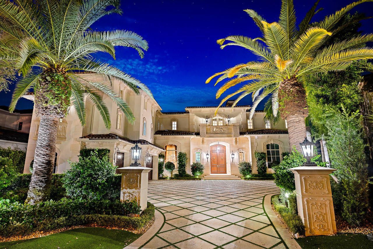 This Grand Waterfront Estate is timeless elegance personified. The moment you walk in the front door beauty & opulence greet you. The finest of craftsmanship & detailing are at every turn in every room... intricate ceiling & floor moldings, Venetian plaster walls, custom stone & wood floors, Tiffany styled glass ceiling in a true wine room, home theater & much, much more. A new roof, the pool & patio were totally redone, marble exterior walls & moldings added, solid brass hardware throughout, a new butlers pantry, new AC units, & the 2-bedroom guest suite redesigned are a few of the items that were renovated in 2017. The lavish master suite is the perfect place to relax & pamper yourself. Enjoy countless hours on the private balcony... (See Supplemental) overlooking the Intracoastal Waterway. Too chilly? Simply light the fireplace. His and hers master baths with custom marble floors, boutique style closets with exquisite detailing. There are 4 guest suites all with private baths in the main house and a 2-bedroom guest suite that has a full kitchen, family room & private entrance. The boaters will love the protected dock for a large yacht and the 168' of water frontage just seconds from the Intracoastal. This is the home for the buyer with discriminating taste.
