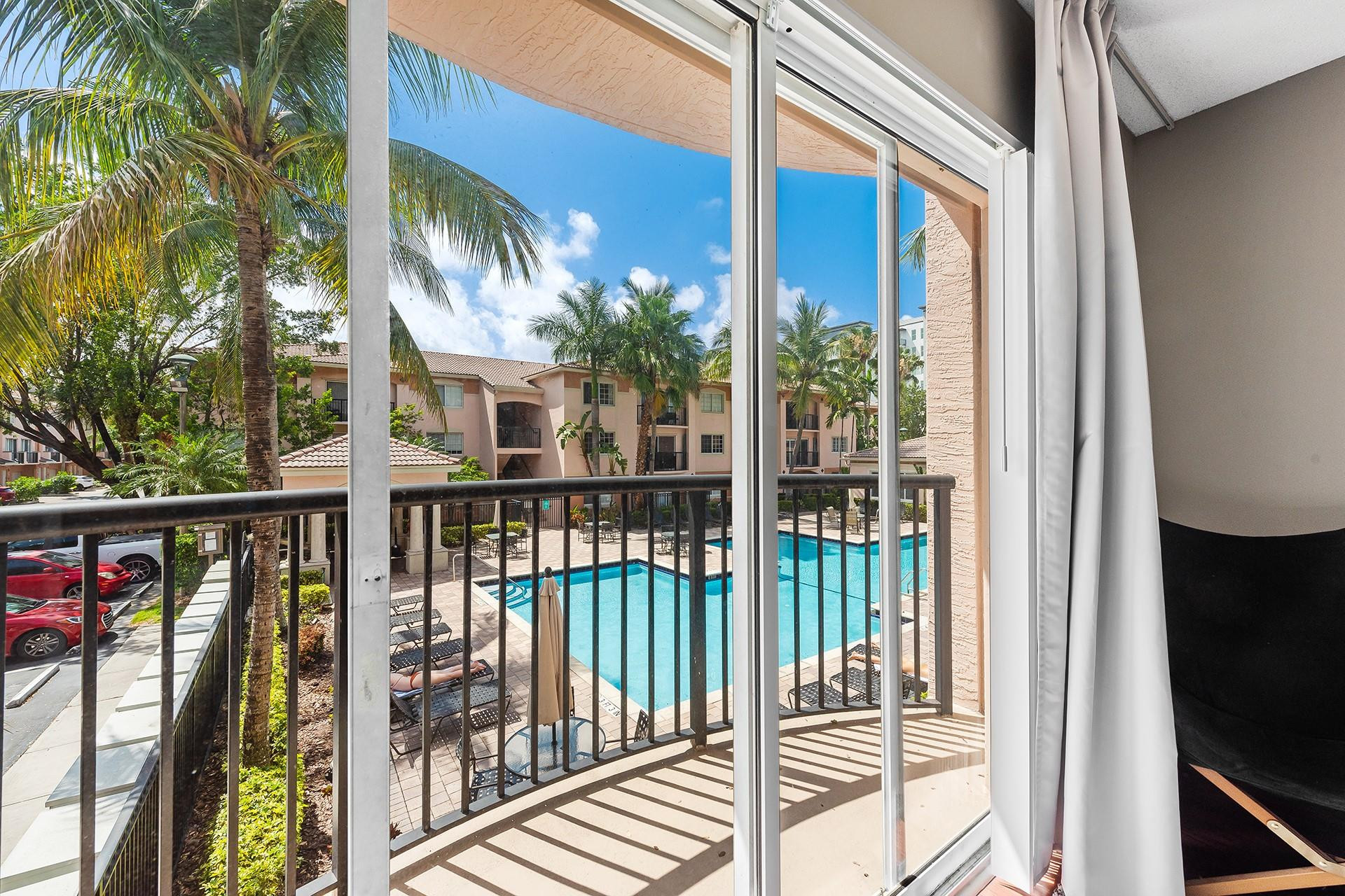 Two Bedroom, two bathroom - FULLY FURNISHED unit in the gated community of Village East. Located less than2 miles from the beach, walking distance to grocery stores, shopping, and many restaurants. Close to all majorhighways, Fort Lauderdale airport, Las Olas and downtown Fort Lauderdale. Unit is very spacious with split floorplan and full size washer and dryer. Located on the second floor with a balcony overlooking the pool area.Community features a heated pool with BBQ grills, gym, and business center.