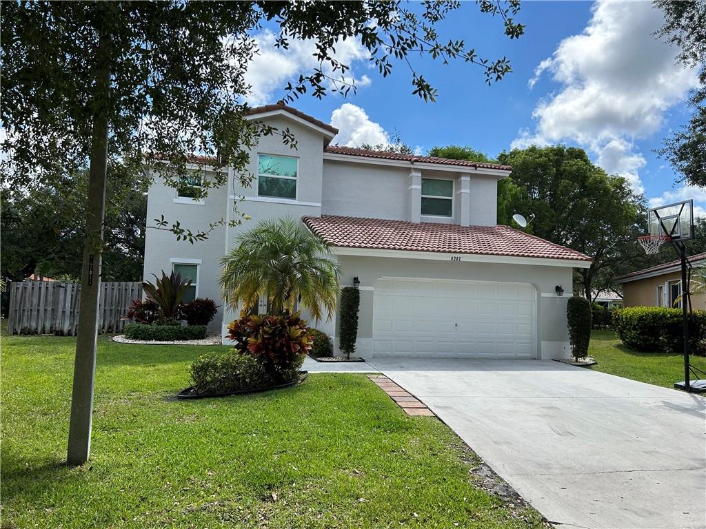 A HOME LIKE THIS ONE IS A RARE FIND!! A TRUE 4 BEDROOM PLUS A LOFT AND 3 FULL BATHROOMS WITH 2 CAR GARAGE WITH TONS OF BACKYARD GREEN SPACE. UPGRADED WITH TODAY'S' LOOK, OPEN PLAN, VOLUME CEILINGS, GRAY TONES! ALL IMPACT WINDOWS AND DOORS! ALL NEW 24X24 PORCELAIN TILE ON 1ST FLOOR, "WOOD LIKE TILE" AND LAMINATE STEPS FOR EASY LIVING. REMODELED CUSTOM WHITE KITCHEN WITH STONE COUNTERS AND FARMHOUSE SINK, SNACK BAR AND SS APPLIANCES. CAMERAS, RING DOORBELL, TANKLESS WH AND CUSTOM DECORATIVE WALL IN FAMILY ROOM. ONE BEDROOM ON FIRST FLOOR WITH FULL BATHROOM. LOFT CAN EASILY BE CONVERTED TO A 5TH BEDROOM OR MAKES PERFECT FLEX ROOM, PLAYROOM OR OFFICE. GATED, COMMUNITY POOL & PLAYGROUND. CLOSE TO PROMENADE, PARKS, TOP SCHOOLS. SELLER RELOCATING OUT OF STATE. Exterior Freshly Painted!!